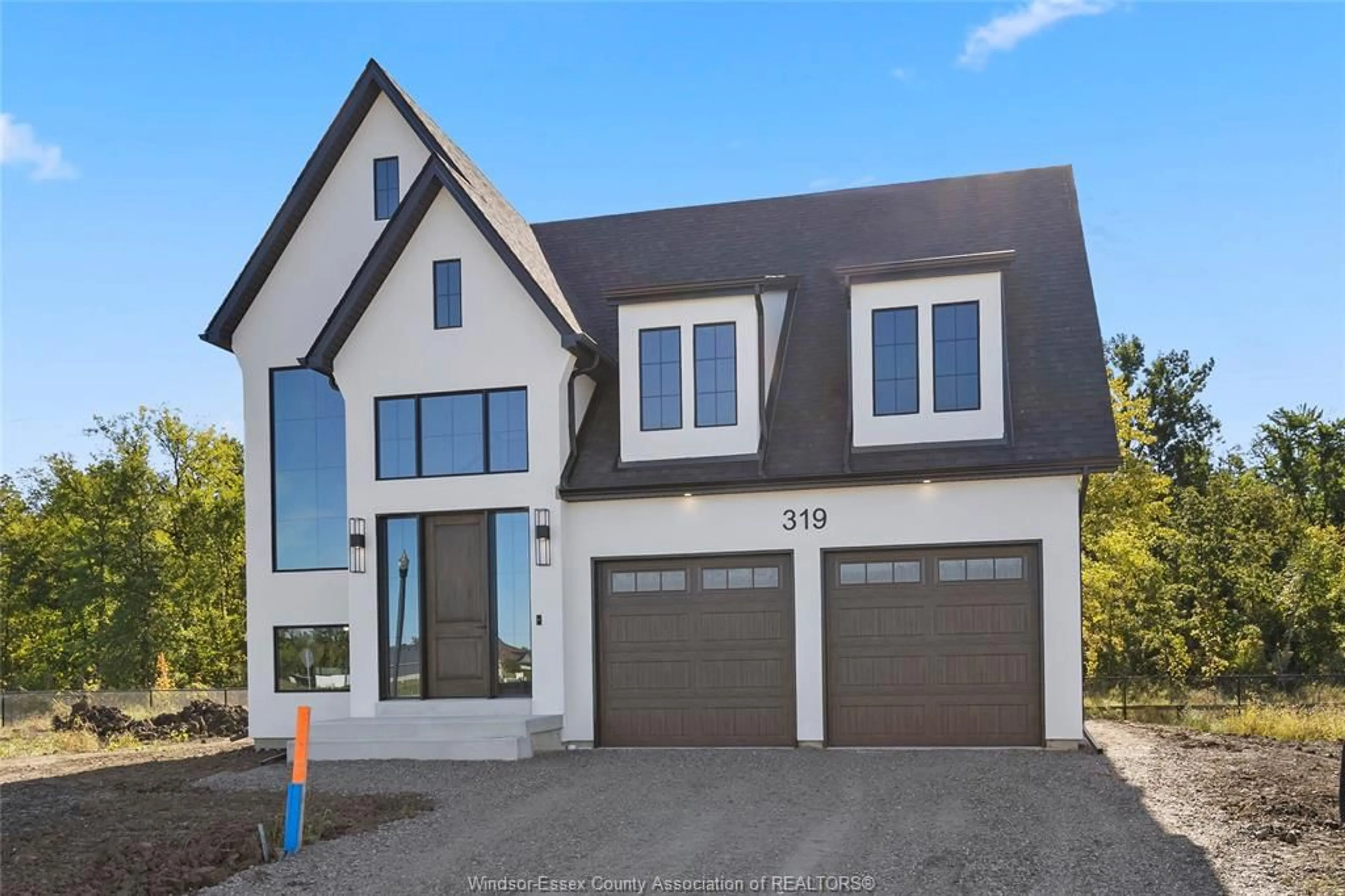 Home with brick exterior material, street for 361 MARLA Cres, Lakeshore Ontario N0R 1A0