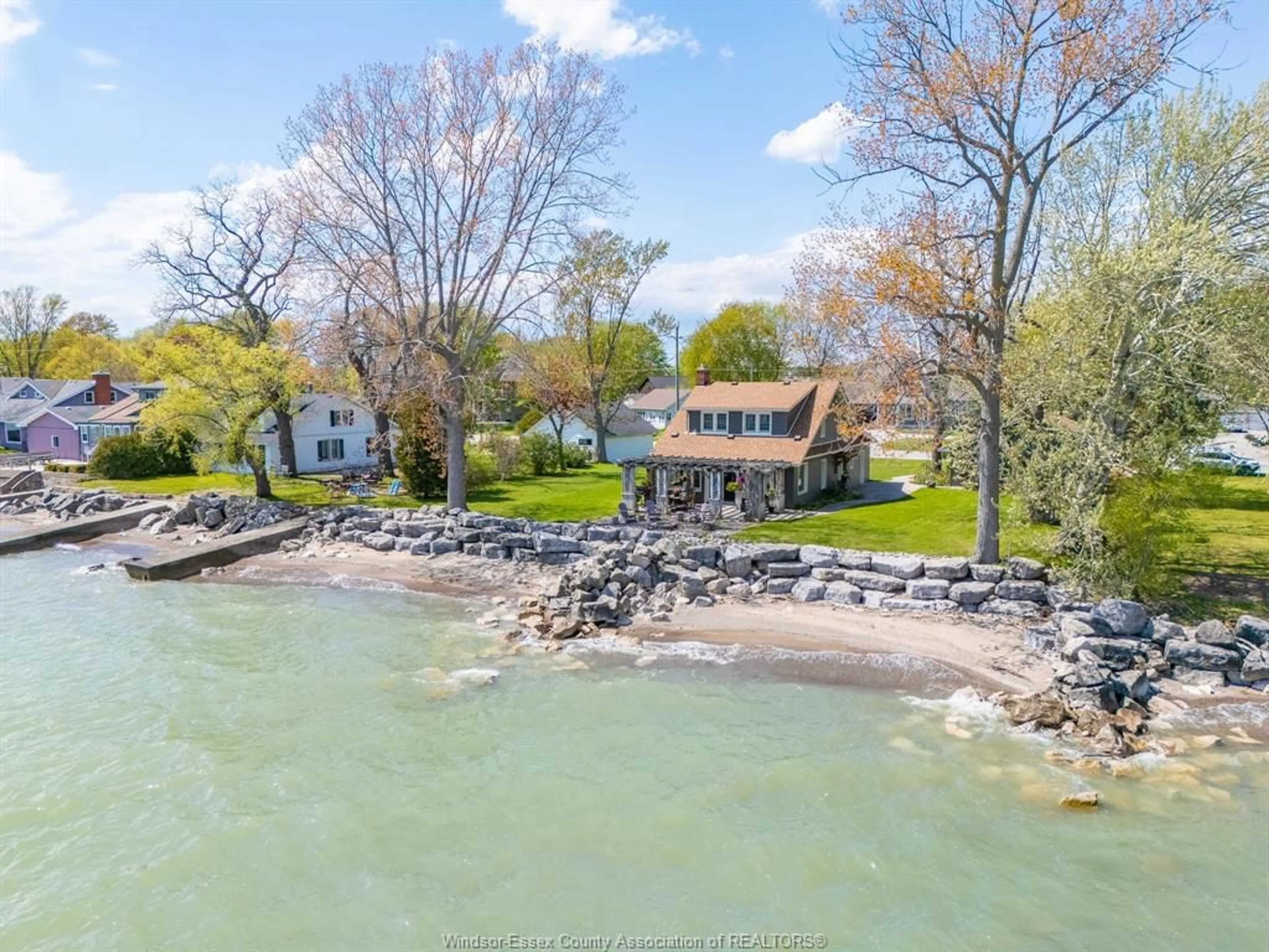 A pic from outside/outdoor area/front of a property/back of a property/a pic from drone, water/lake/river/ocean view for 1465 HERITAGE Rd, Kingsville Ontario N9Y 2E6
