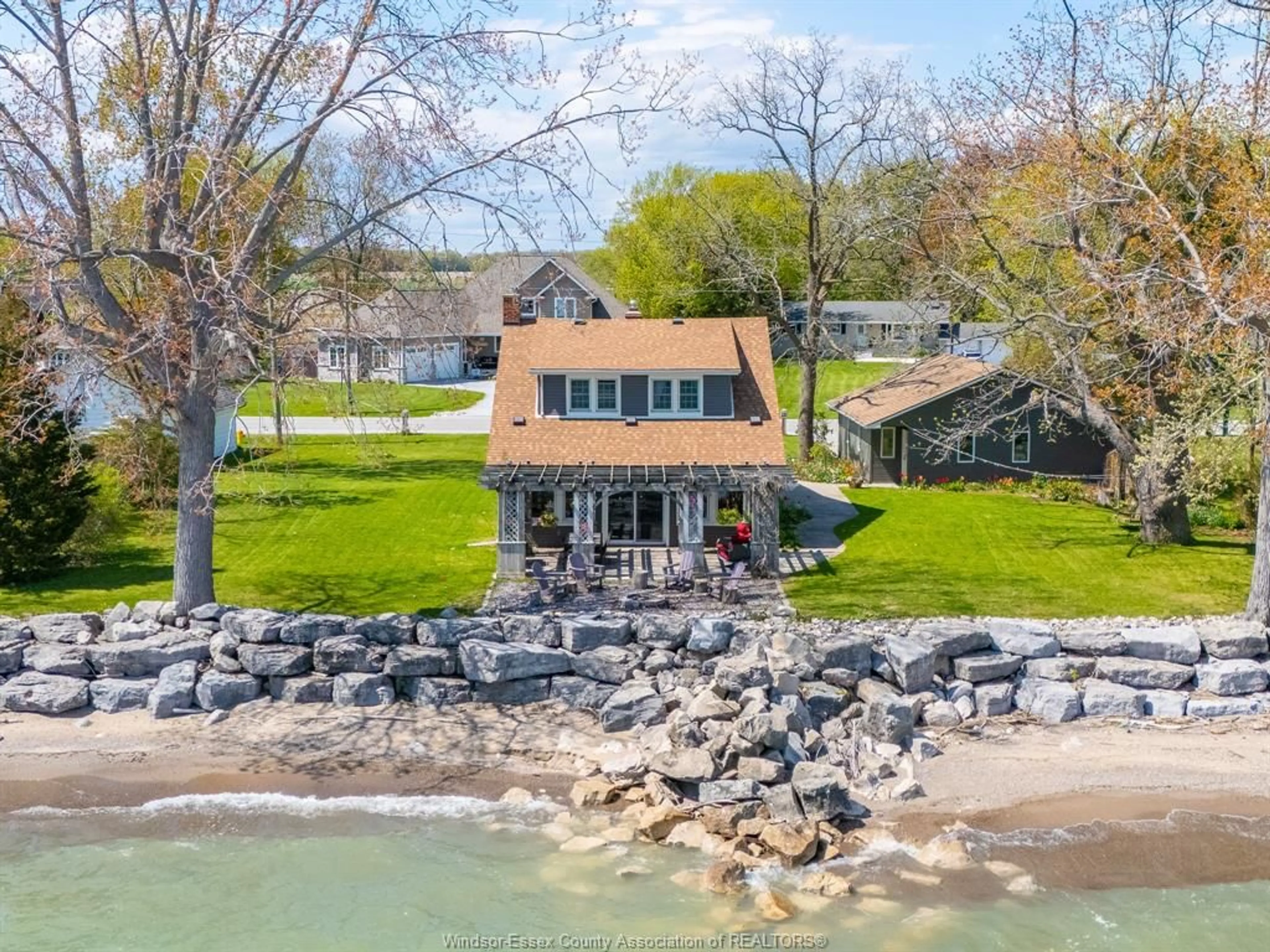 A pic from outside/outdoor area/front of a property/back of a property/a pic from drone, water/lake/river/ocean view for 1465 HERITAGE Rd, Kingsville Ontario N9Y 2E6