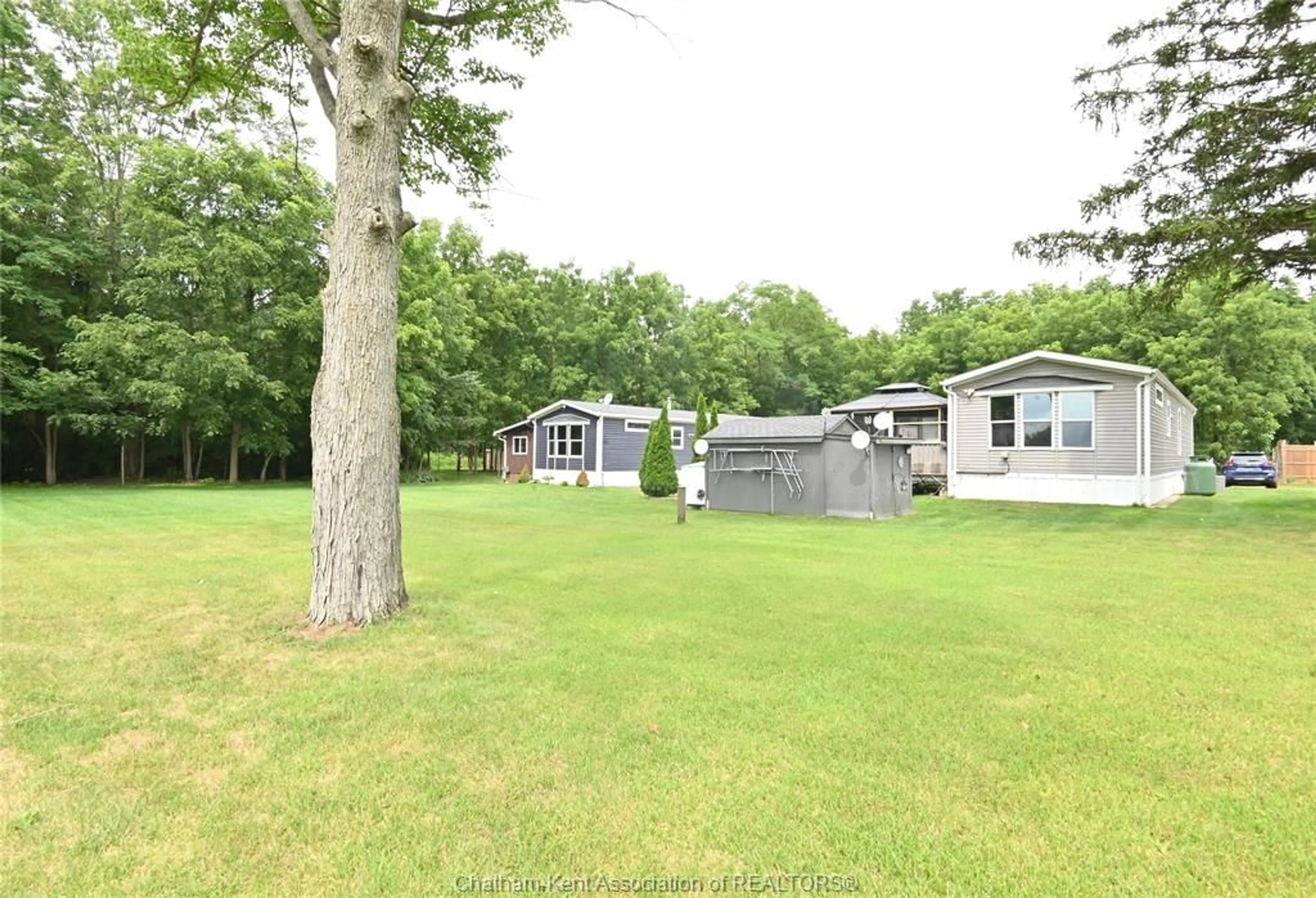 A pic from outside/outdoor area/front of a property/back of a property/a pic from drone, water/lake/river/ocean view for 15895 Longwoods Rd, Zone Township Ontario N0P 1C0