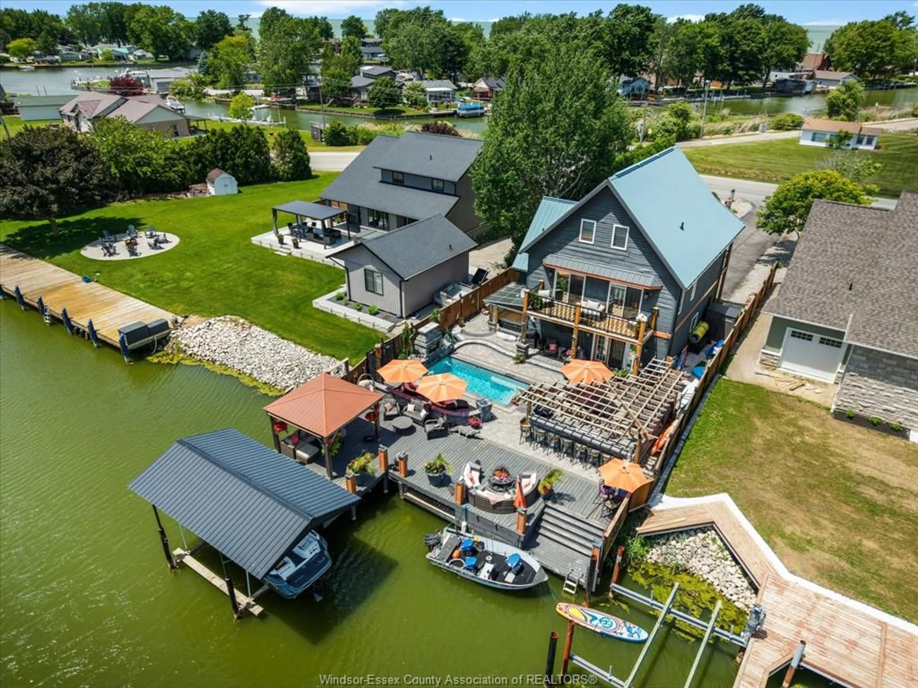 A pic from outside/outdoor area/front of a property/back of a property/a pic from drone, water/lake/river/ocean view for 19037 LAKESIDE Dr, Lighthouse Cove Ontario N0P 2L0