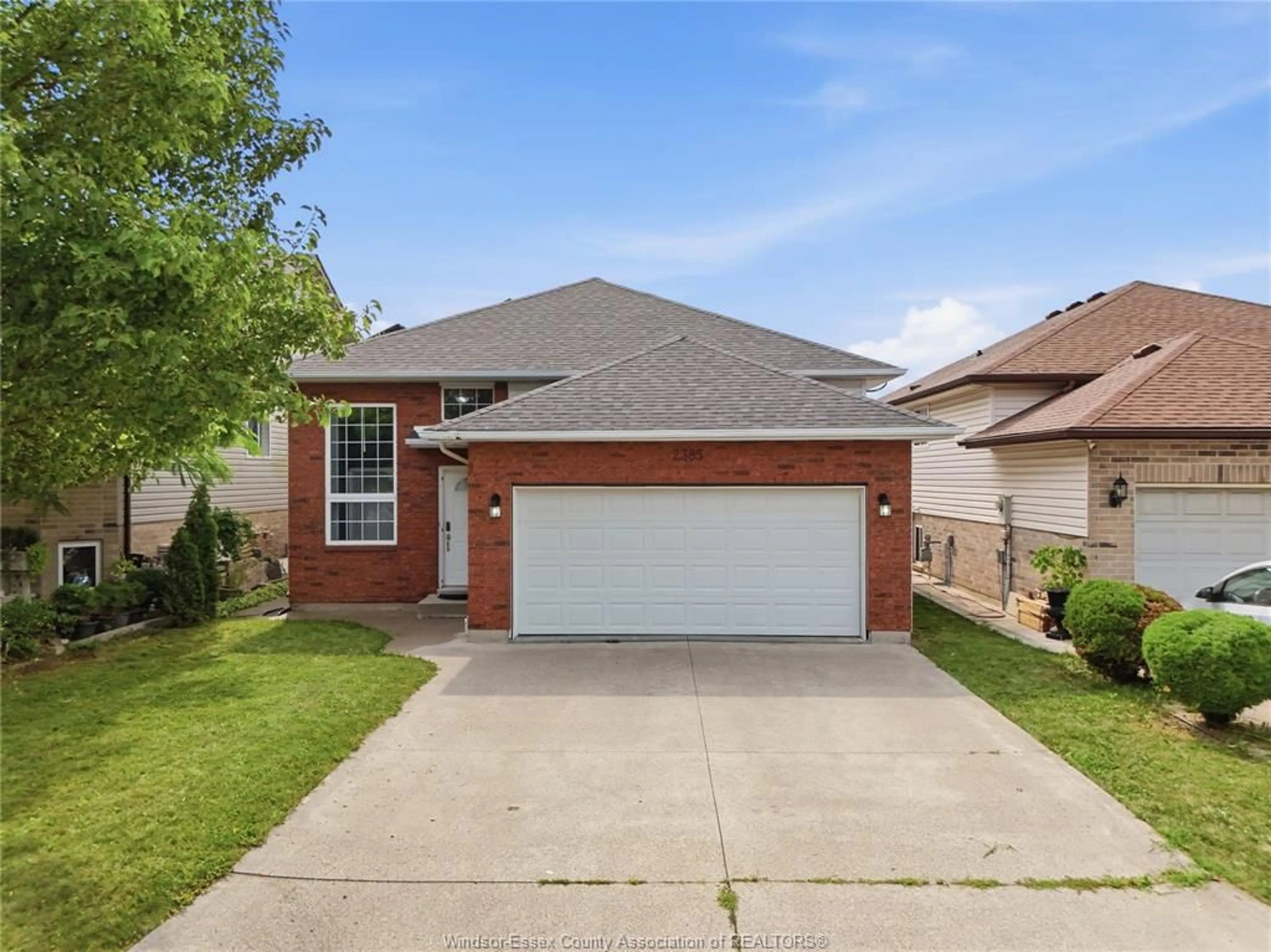 Home with brick exterior material, street for 2385 GATWICK, Windsor Ontario N8P 1Y7