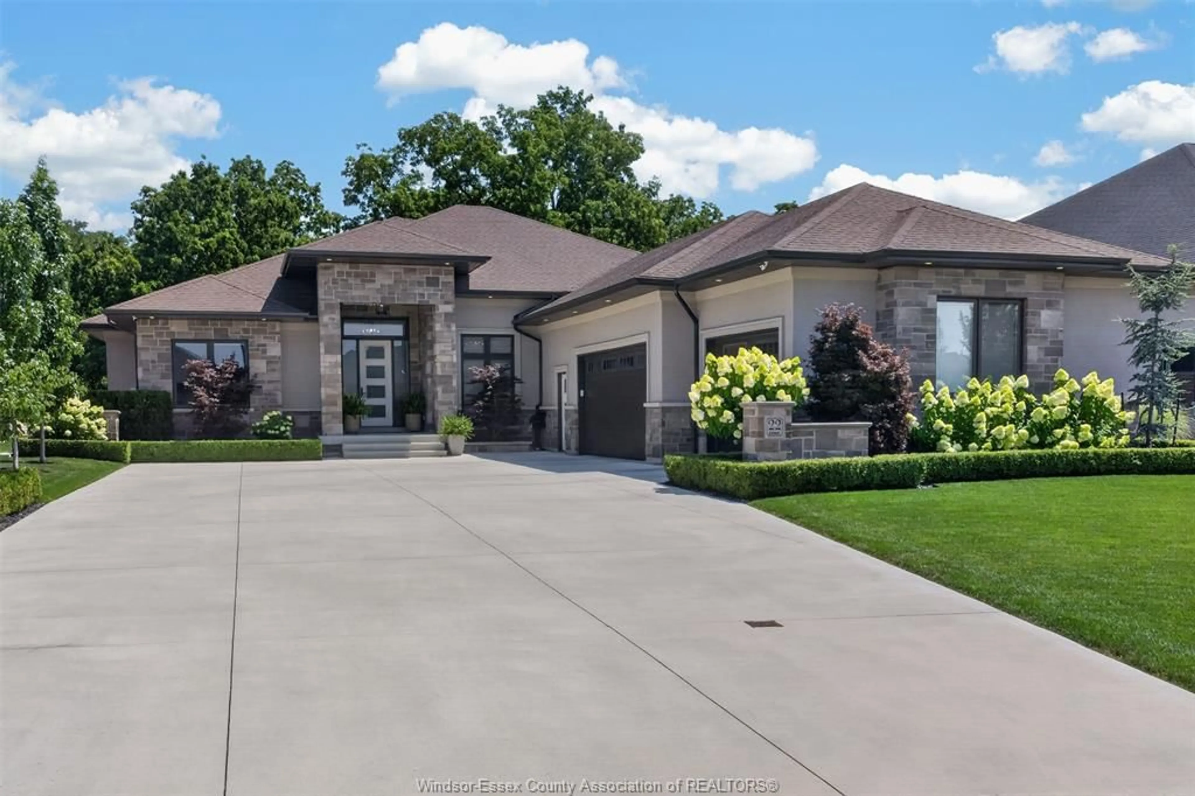 Home with brick exterior material, street for 22 Emily Ave, Kingsville Ontario N9Y 0C8