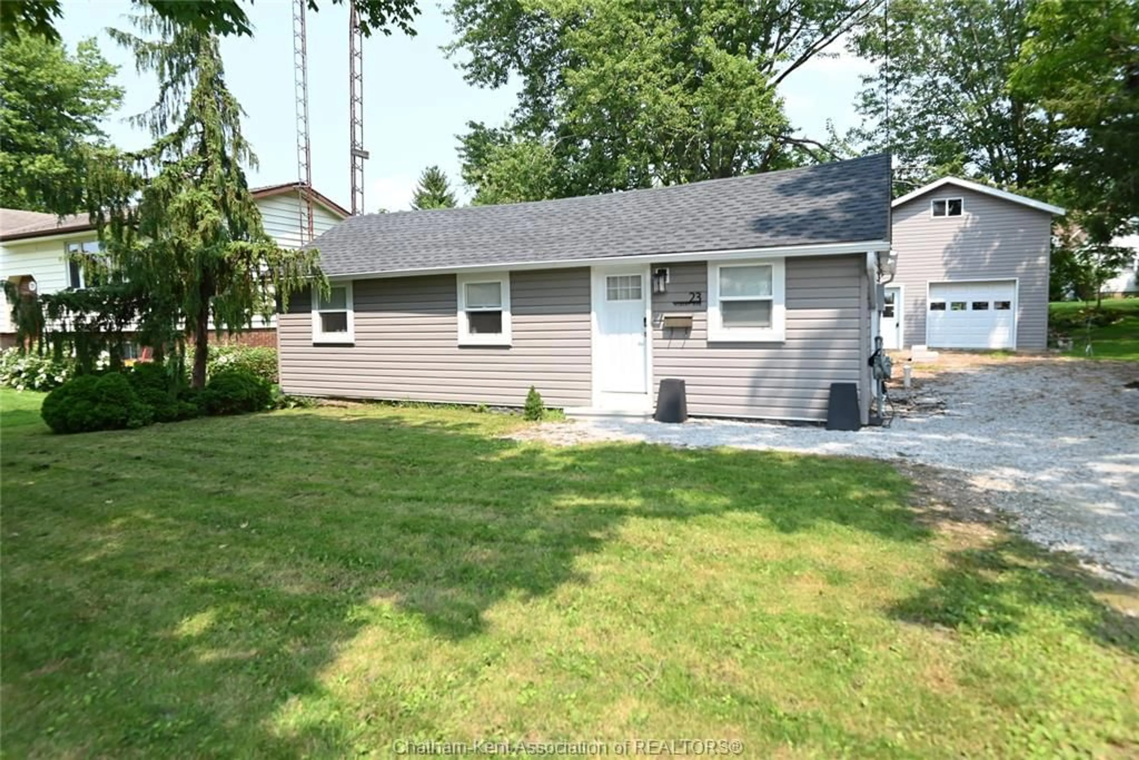 Home with vinyl exterior material, street for 23 Albert St, Ridgetown Ontario N0P 2C0