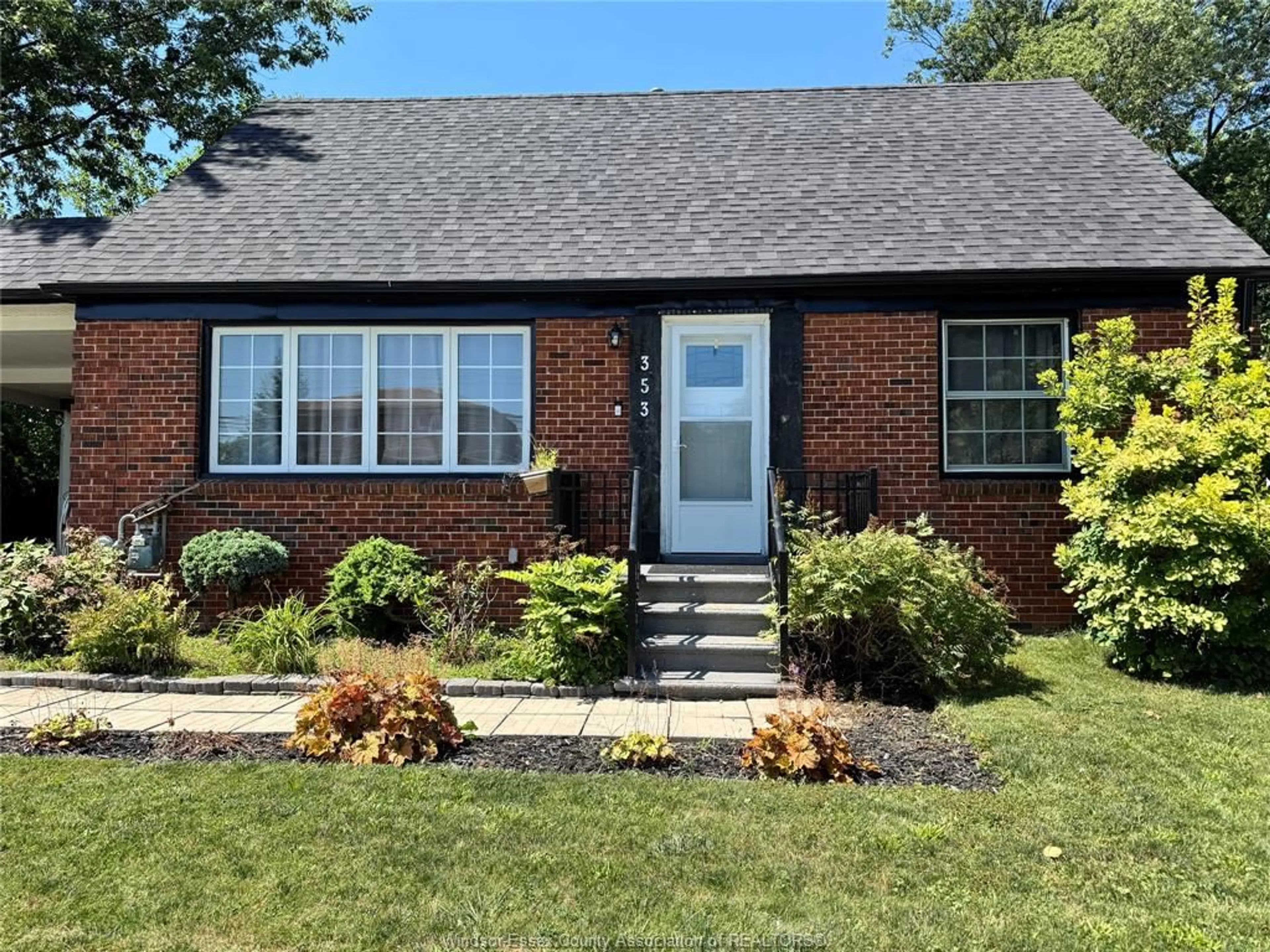 Home with brick exterior material, street for 353 LAUZON Rd, Windsor Ontario N8S 3M1