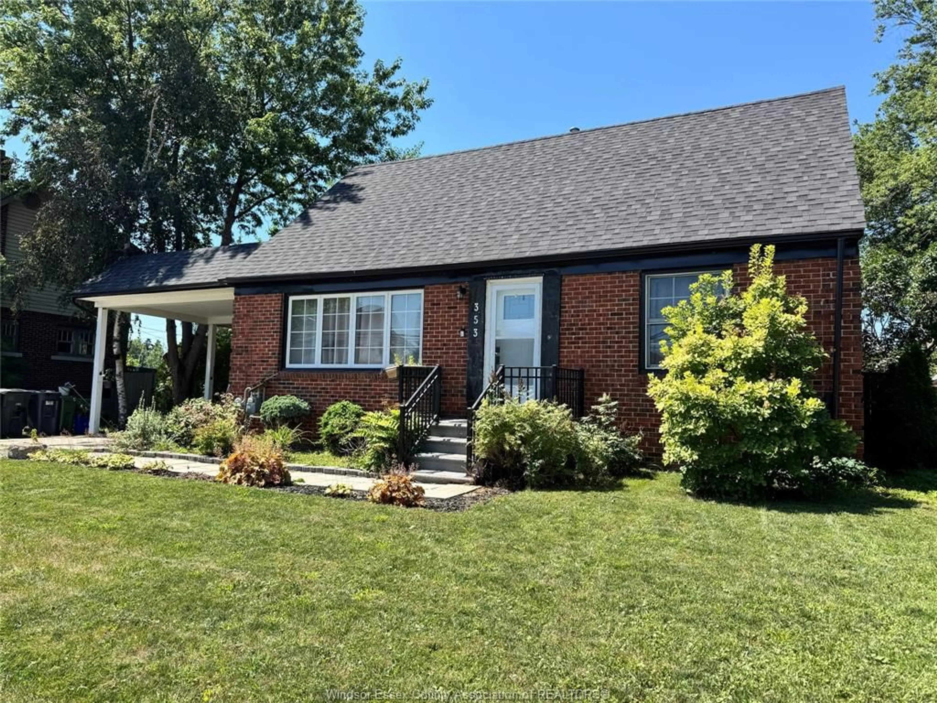 Home with brick exterior material, street for 353 LAUZON Rd, Windsor Ontario N8S 3M1