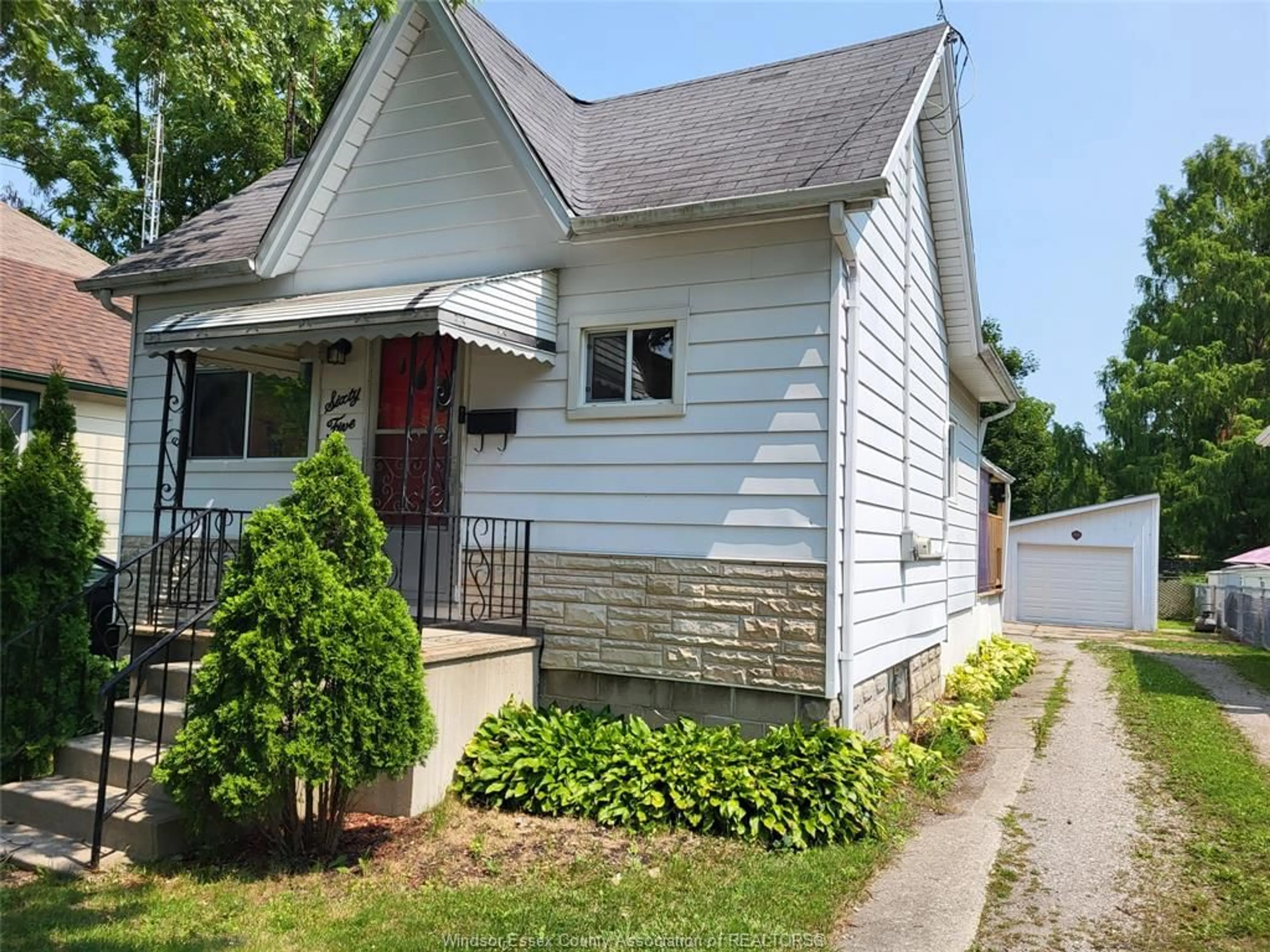 Home with vinyl exterior material, street for 65 PRINCE St, Chatham Ontario N7M 4N8