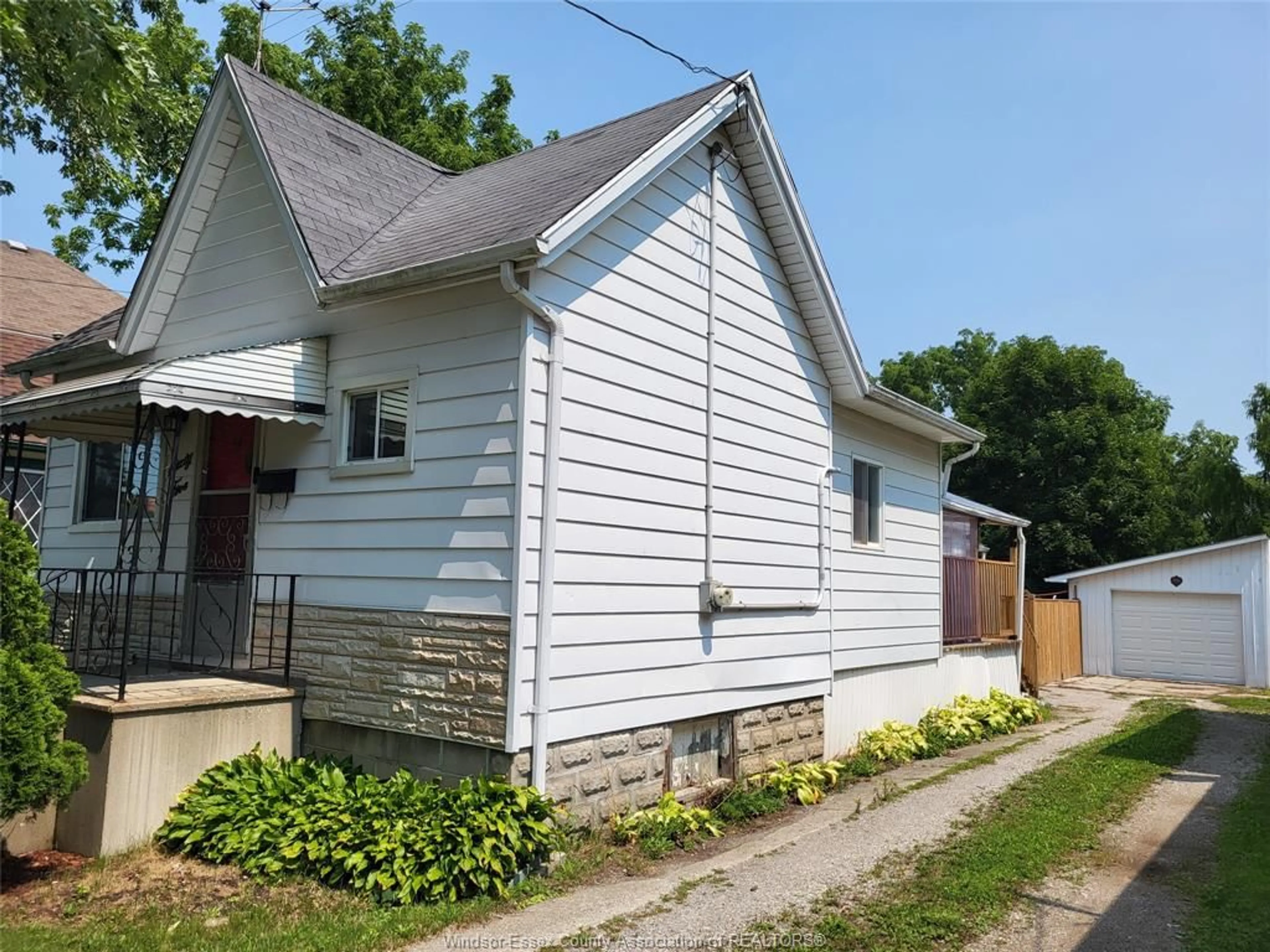 Home with vinyl exterior material, street for 65 PRINCE St, Chatham Ontario N7M 4N8