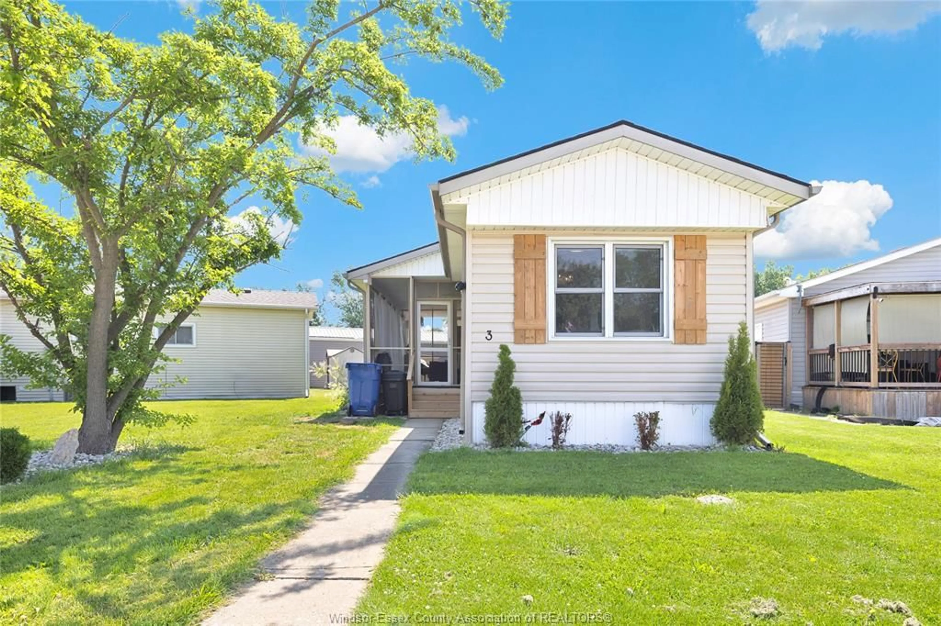 Home with vinyl exterior material, street for 3 LILAC, McGregor Ontario N0R 1J0