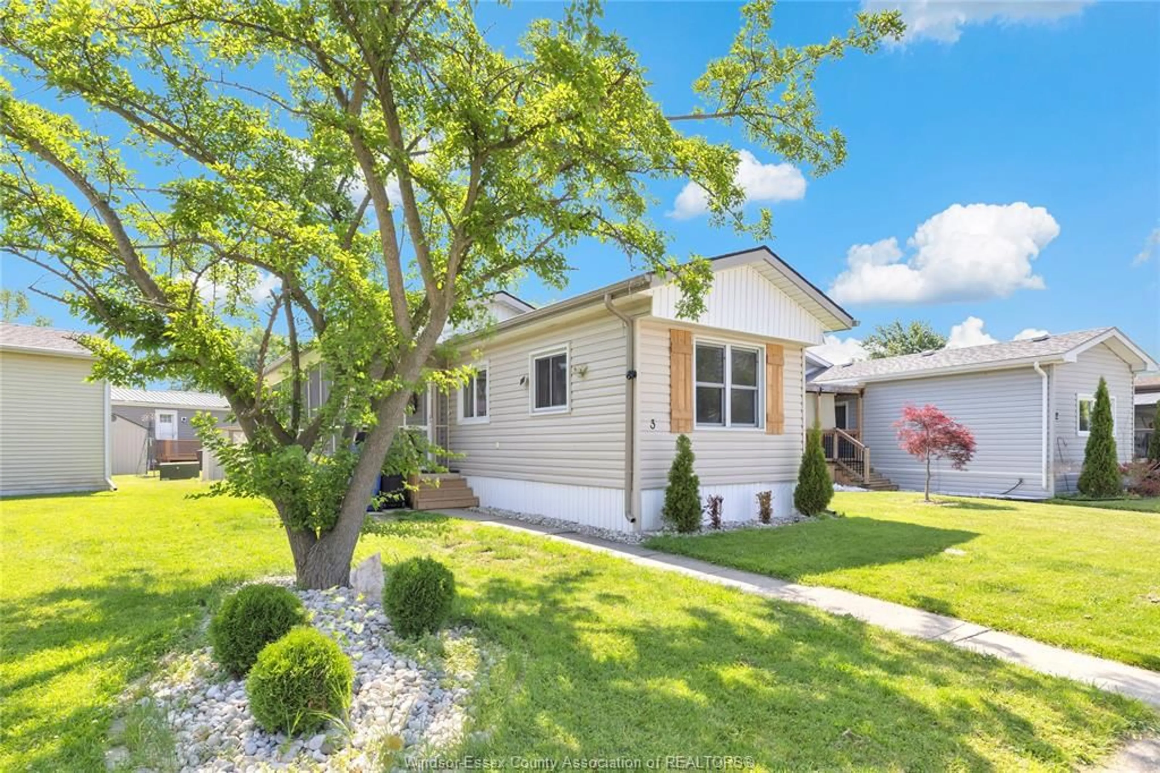 Home with vinyl exterior material, street for 3 LILAC, McGregor Ontario N0R 1J0