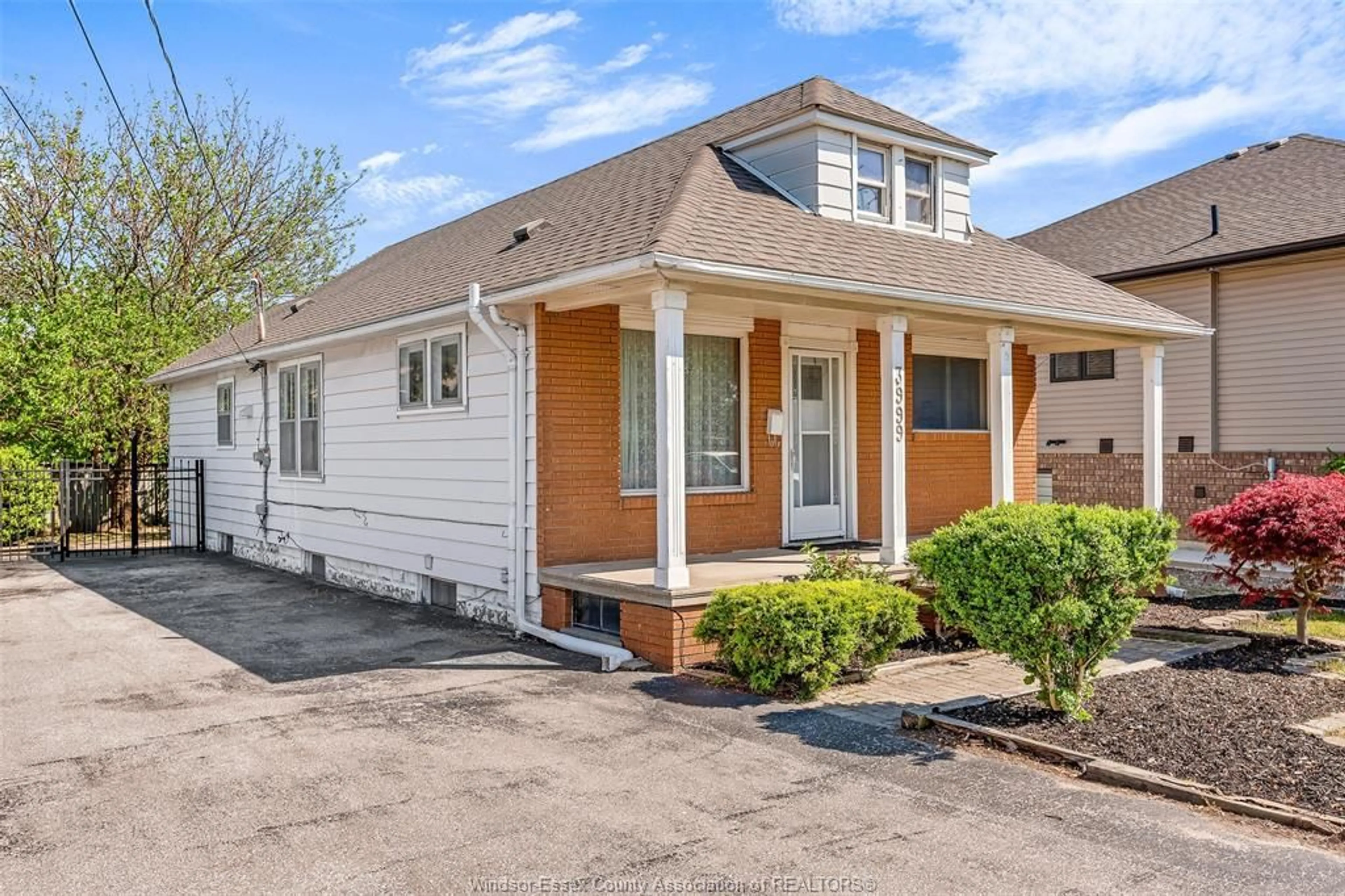 Home with vinyl exterior material, street for 3999 GRAND MARAIS Rd, Windsor Ontario N8W 1W9