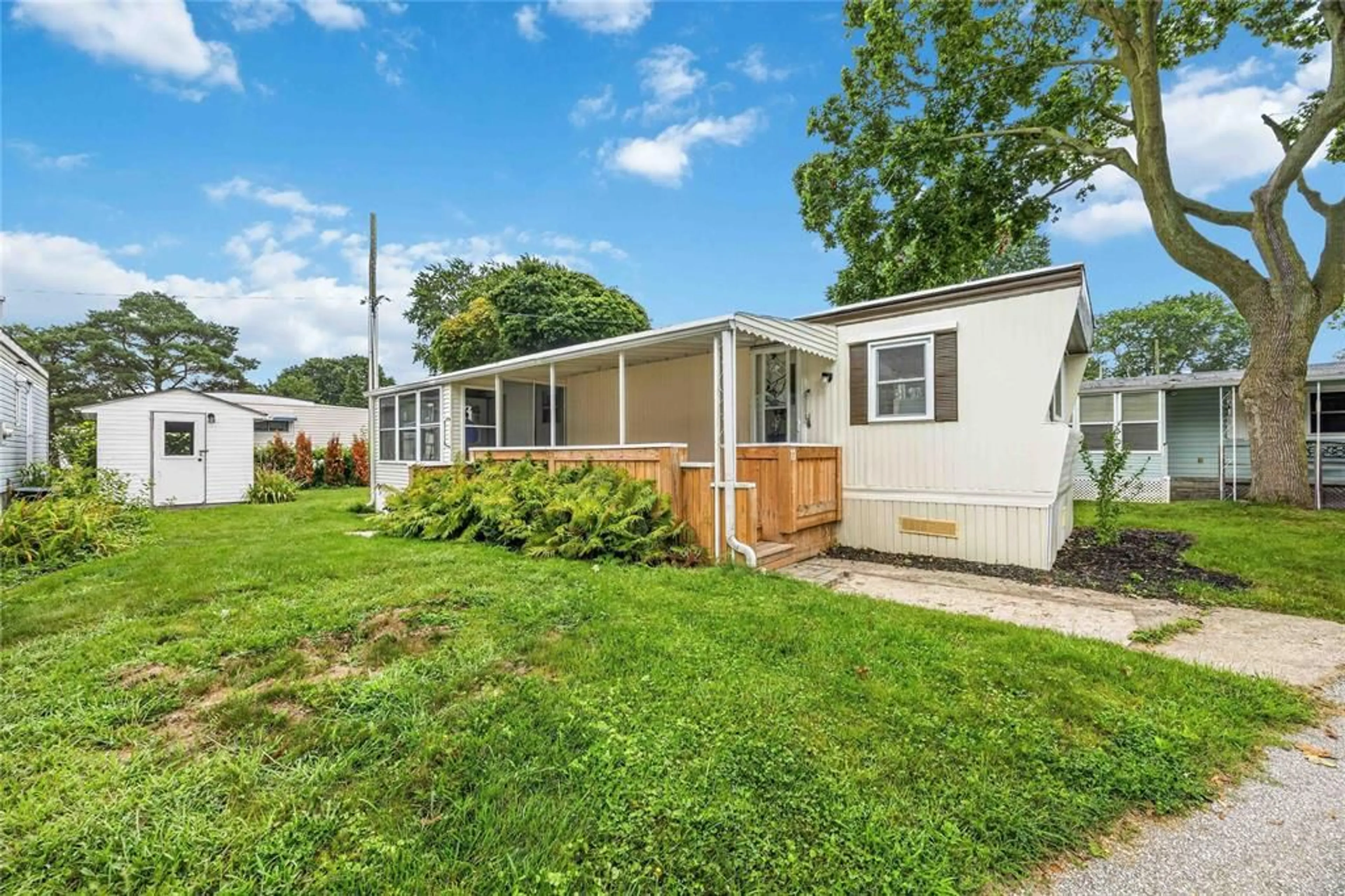 Home with vinyl exterior material, street for 1940 London Line #11, Sarnia Ontario N7W 1B5