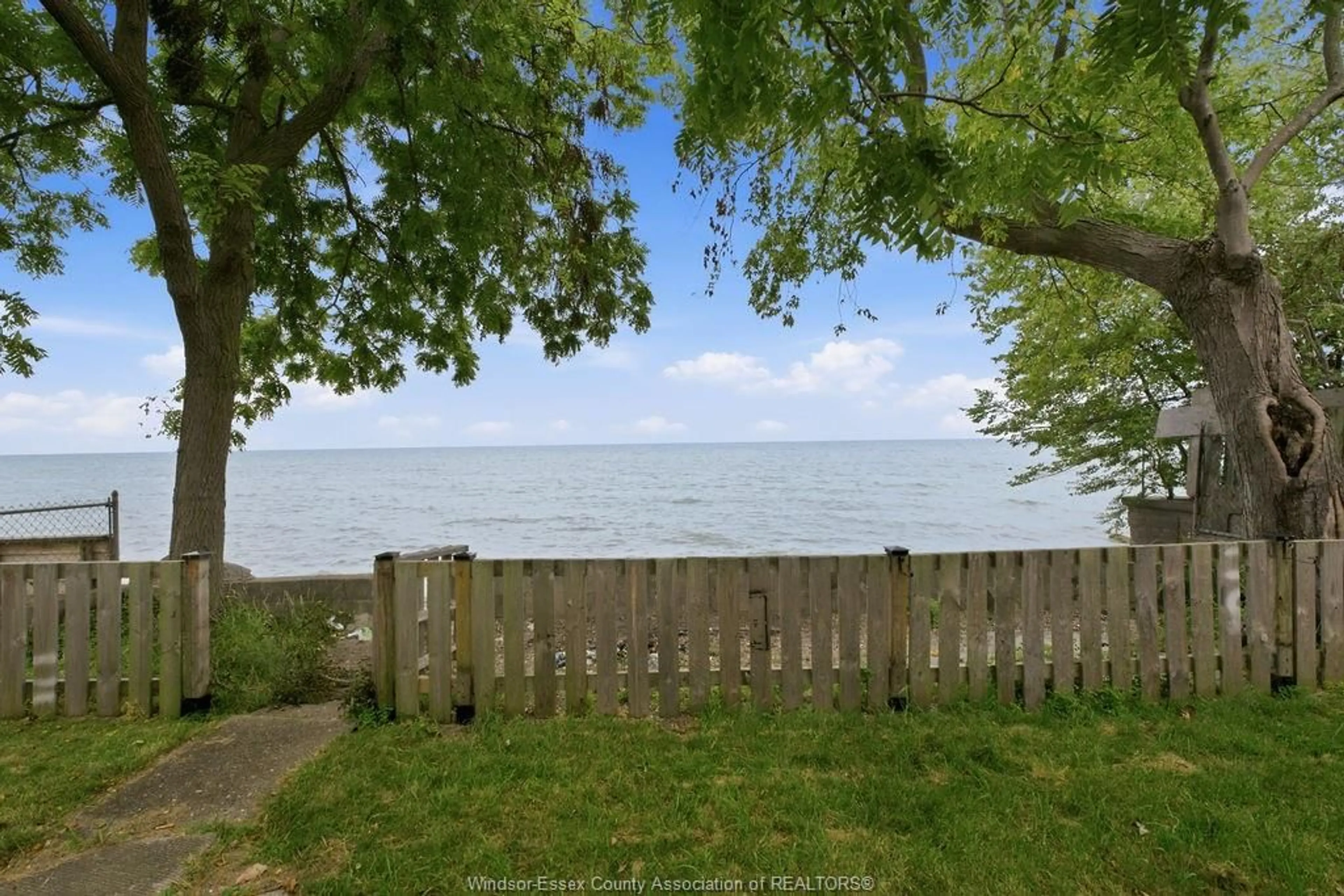 A pic from outside/outdoor area/front of a property/back of a property/a pic from drone, water/lake/river/ocean view for 1437 HERITAGE Rd, Kingsville Ontario N9Y 2E6