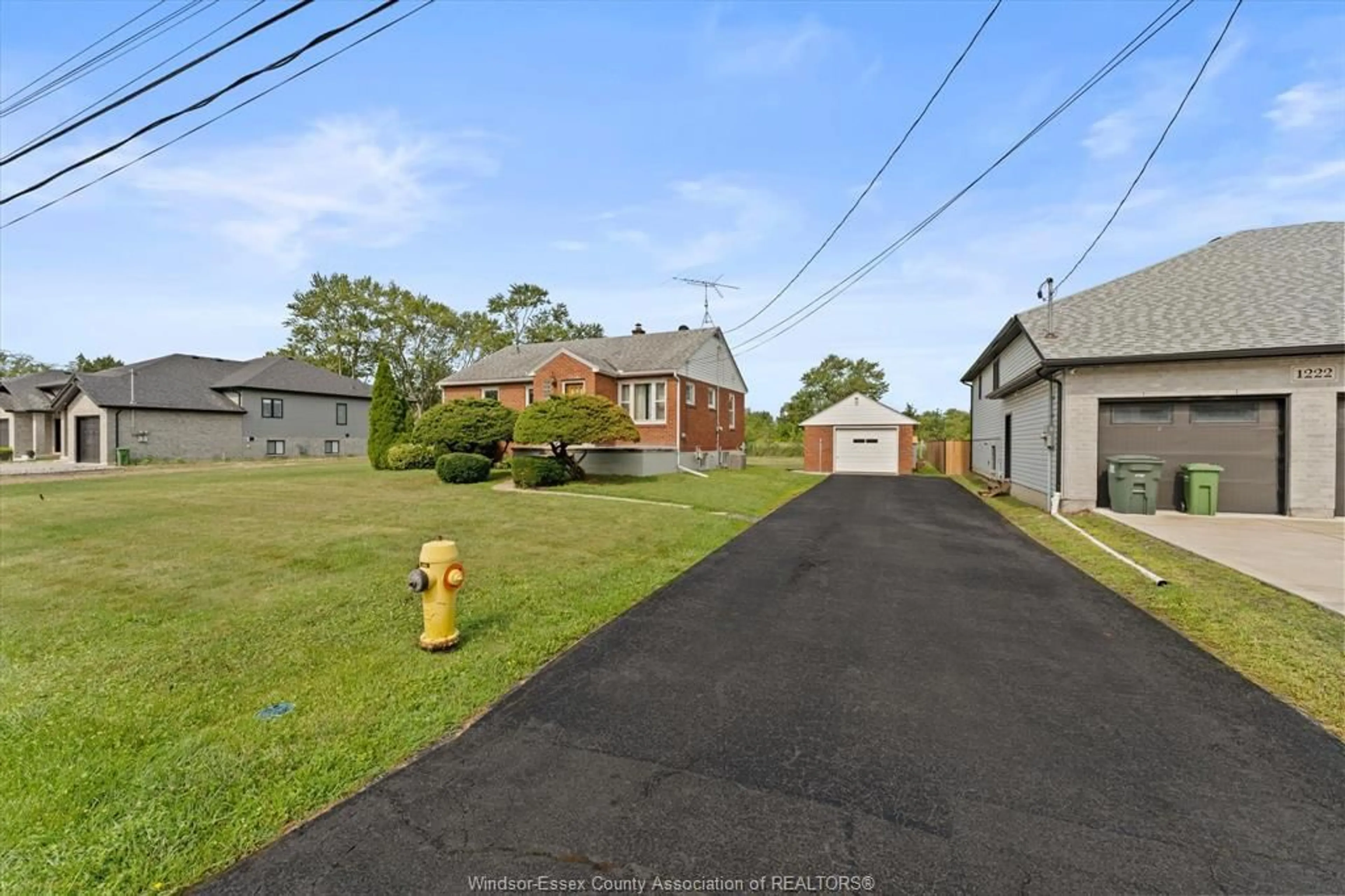 A pic from outside/outdoor area/front of a property/back of a property/a pic from drone, street for 1226 SURREY Dr, LaSalle Ontario N9H 1A9