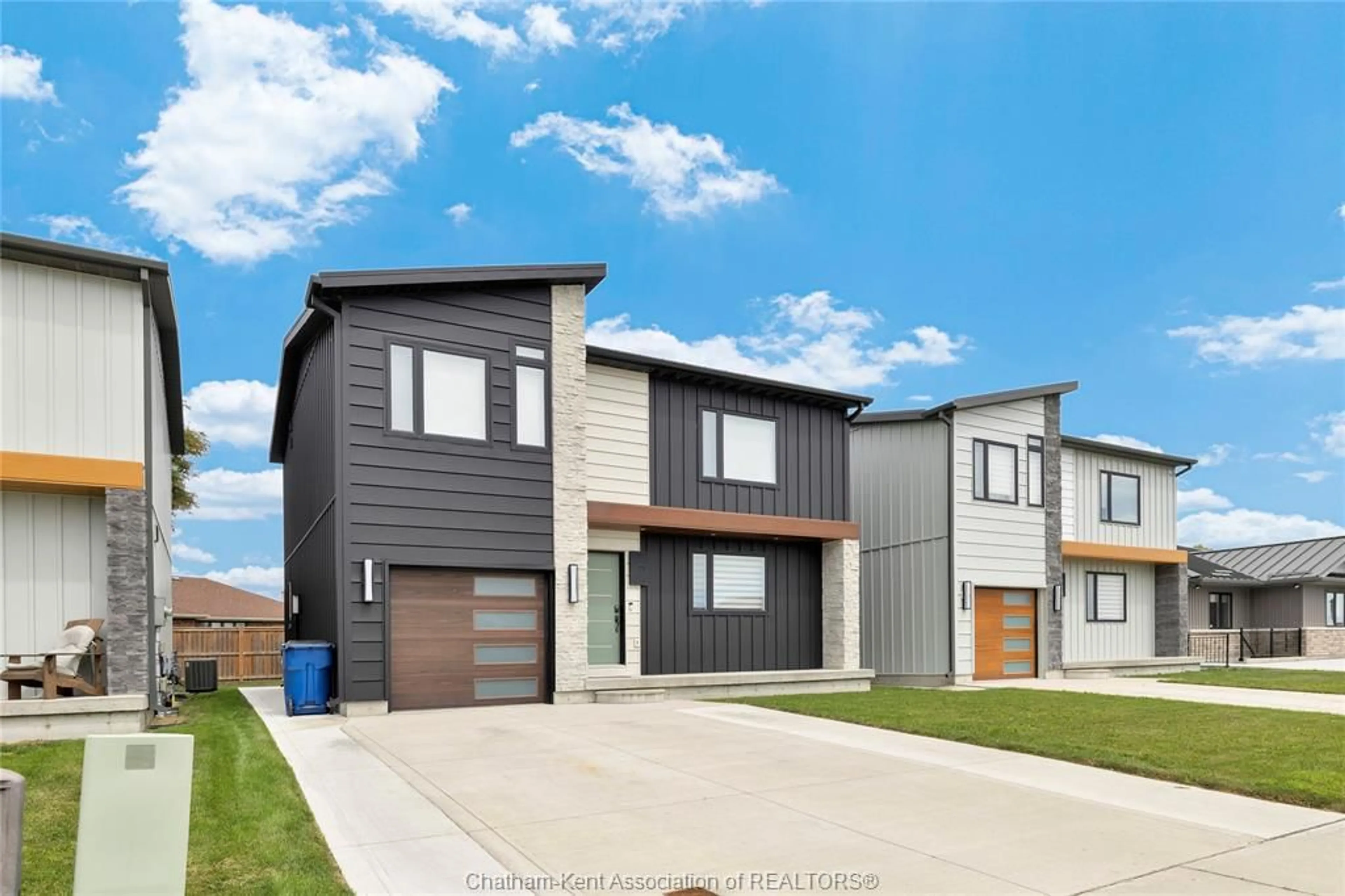 Home with vinyl exterior material, street for 71 Churchill Park Rd, Chatham Ontario N7M 0R8