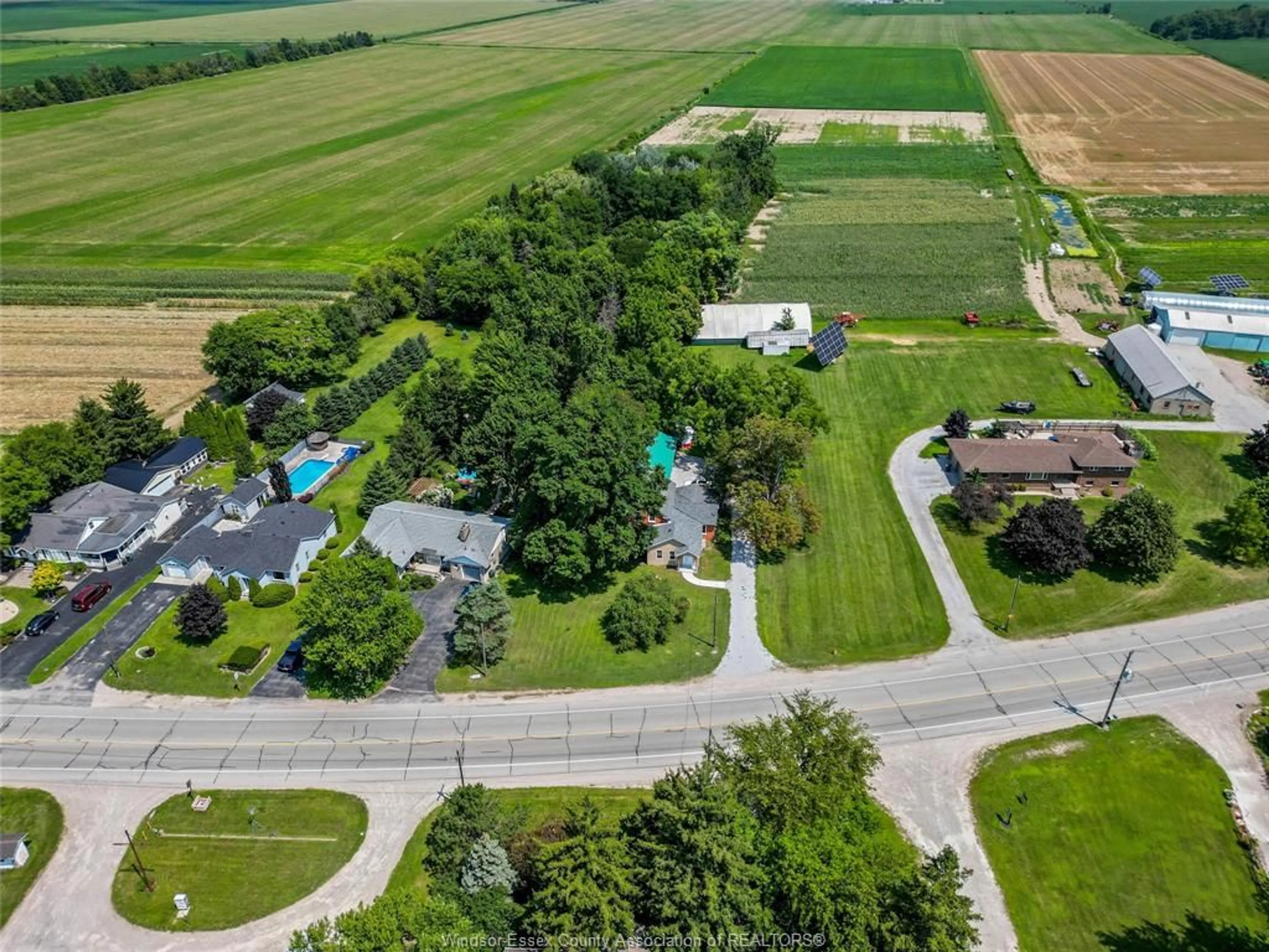 A pic from outside/outdoor area/front of a property/back of a property/a pic from drone, street for 458 COUNTY RD 34, Kingsville Ontario N8M 2X5