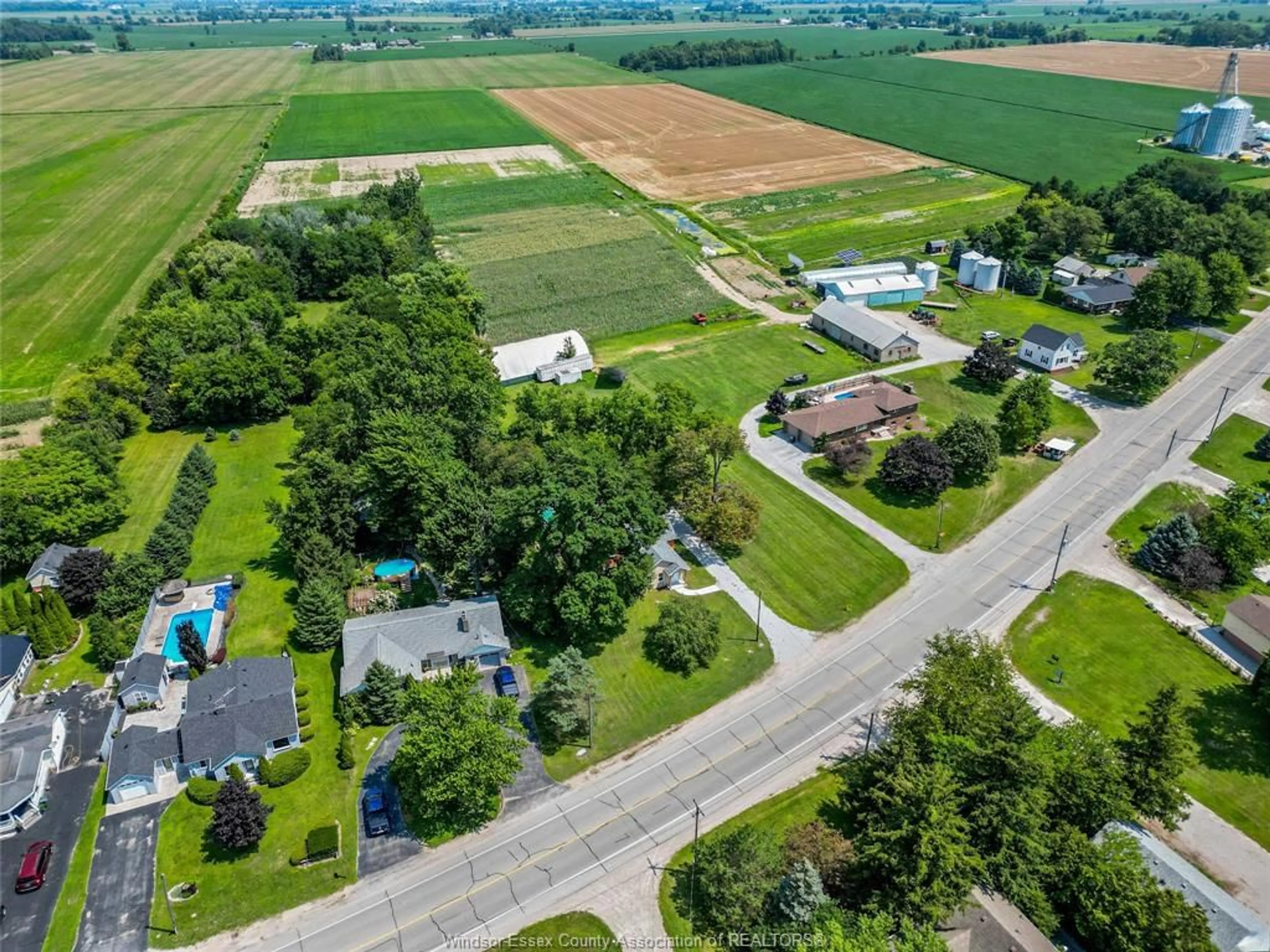 A pic from outside/outdoor area/front of a property/back of a property/a pic from drone, street for 458 COUNTY RD 34, Kingsville Ontario N8M 2X5