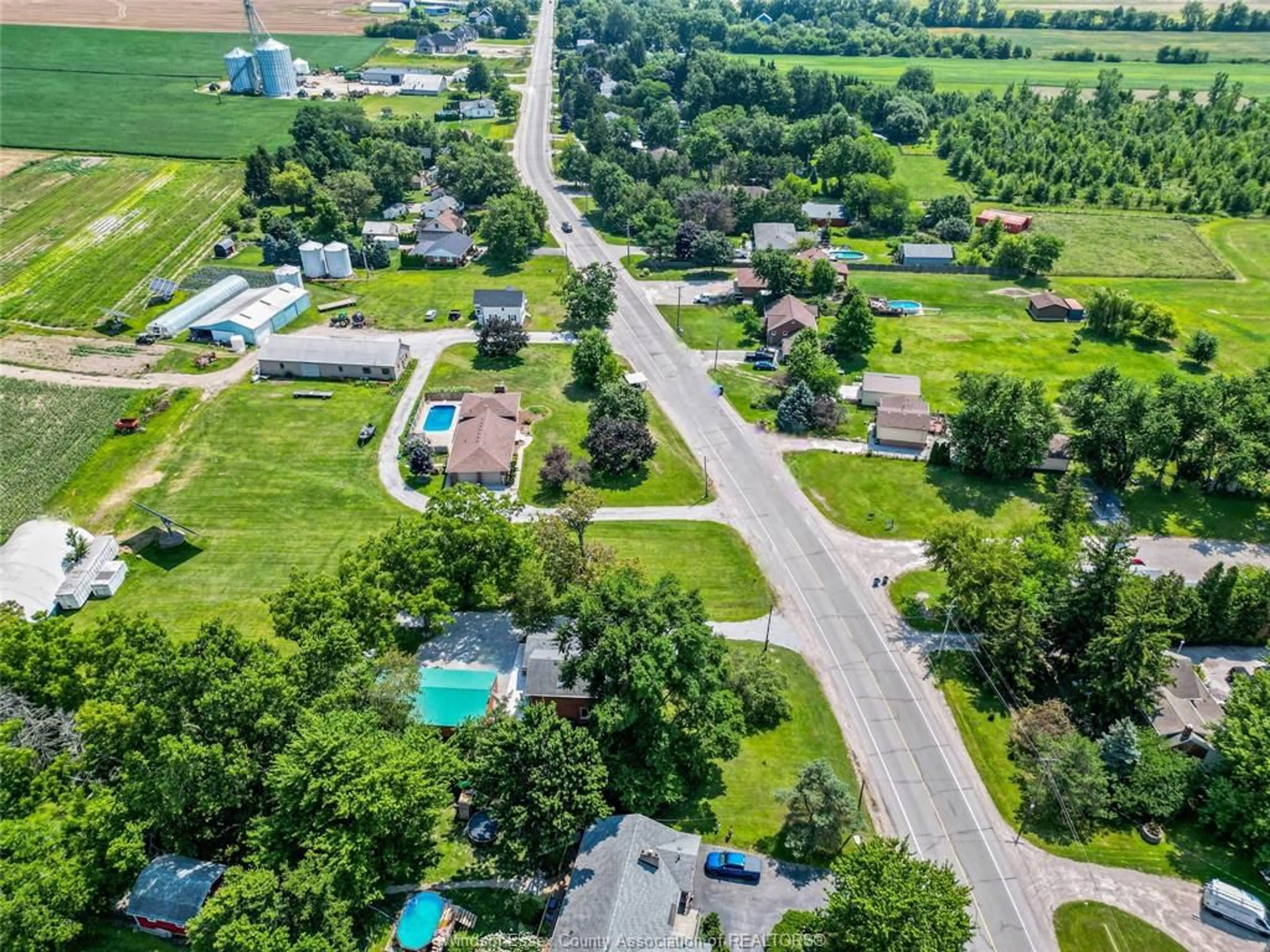 A pic from outside/outdoor area/front of a property/back of a property/a pic from drone, street for 458 COUNTY RD 34, Kingsville Ontario N8M 2X5