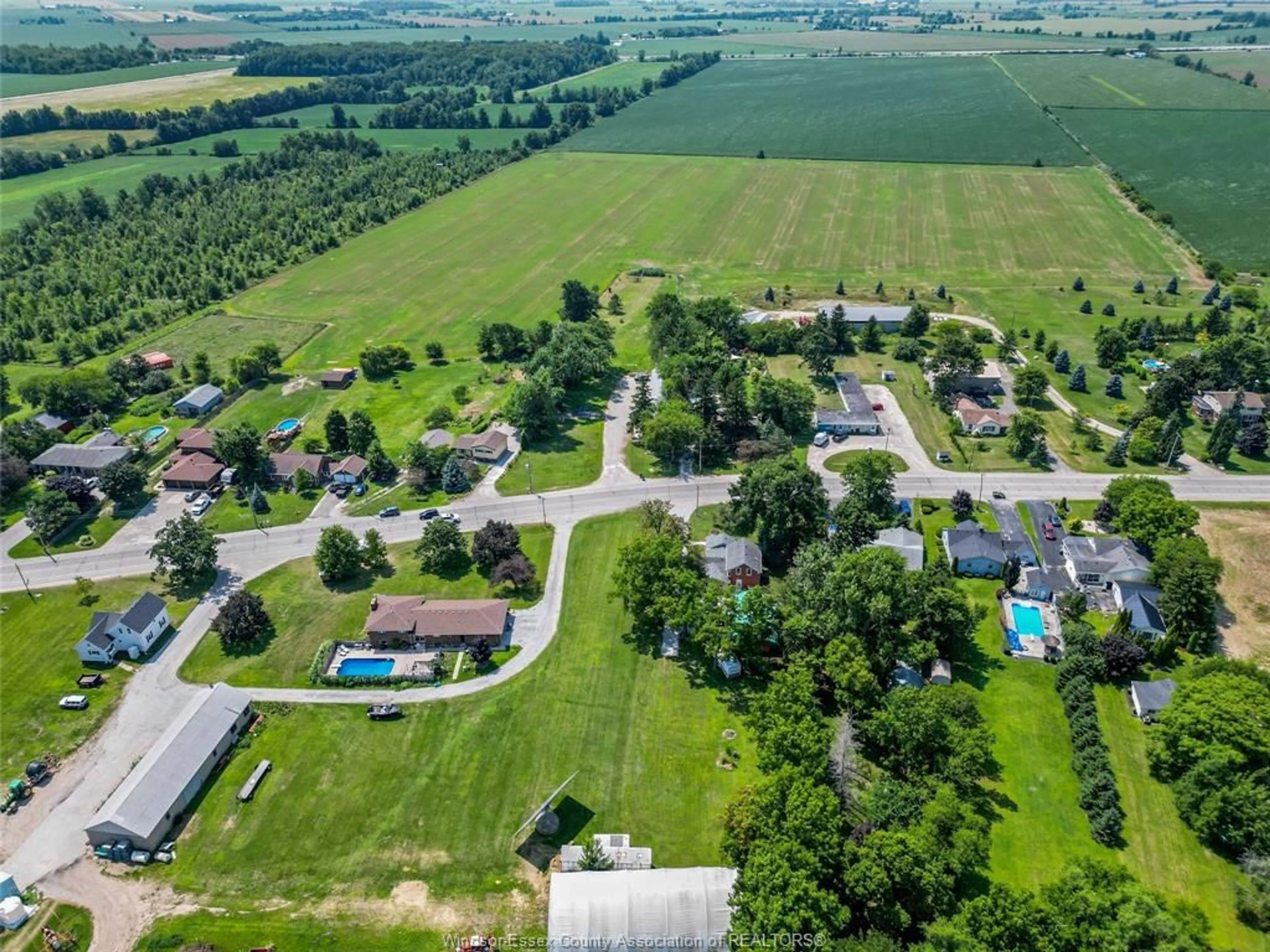 A pic from outside/outdoor area/front of a property/back of a property/a pic from drone, unknown for 458 COUNTY RD 34, Kingsville Ontario N8M 2X5