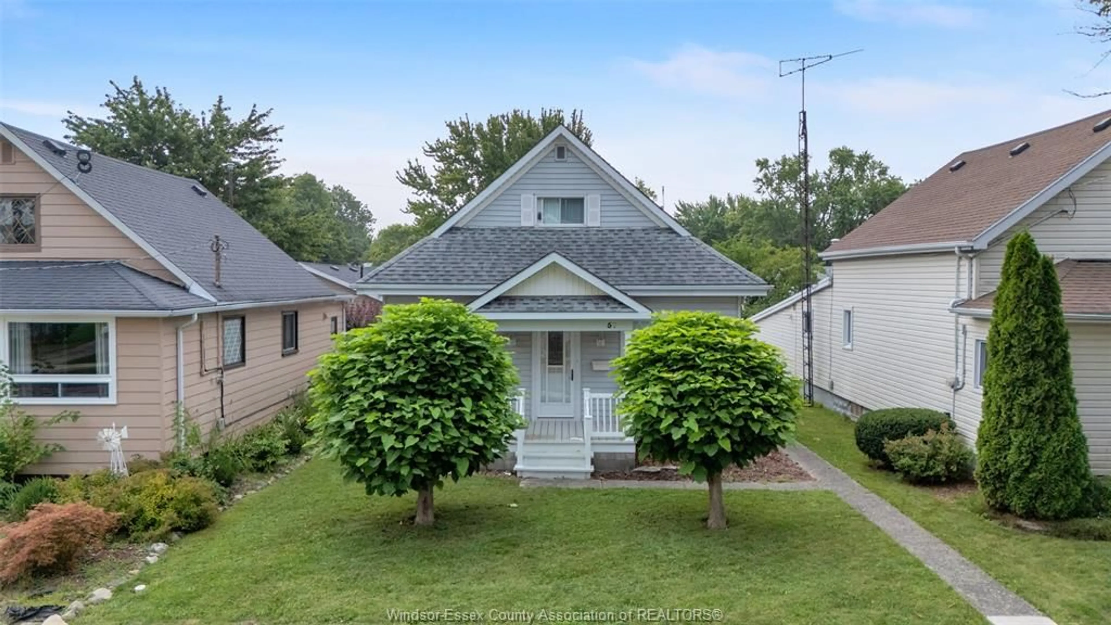 A pic from outside/outdoor area/front of a property/back of a property/a pic from drone, street for 57 Canal St, Tilbury Ontario N0P 2L0