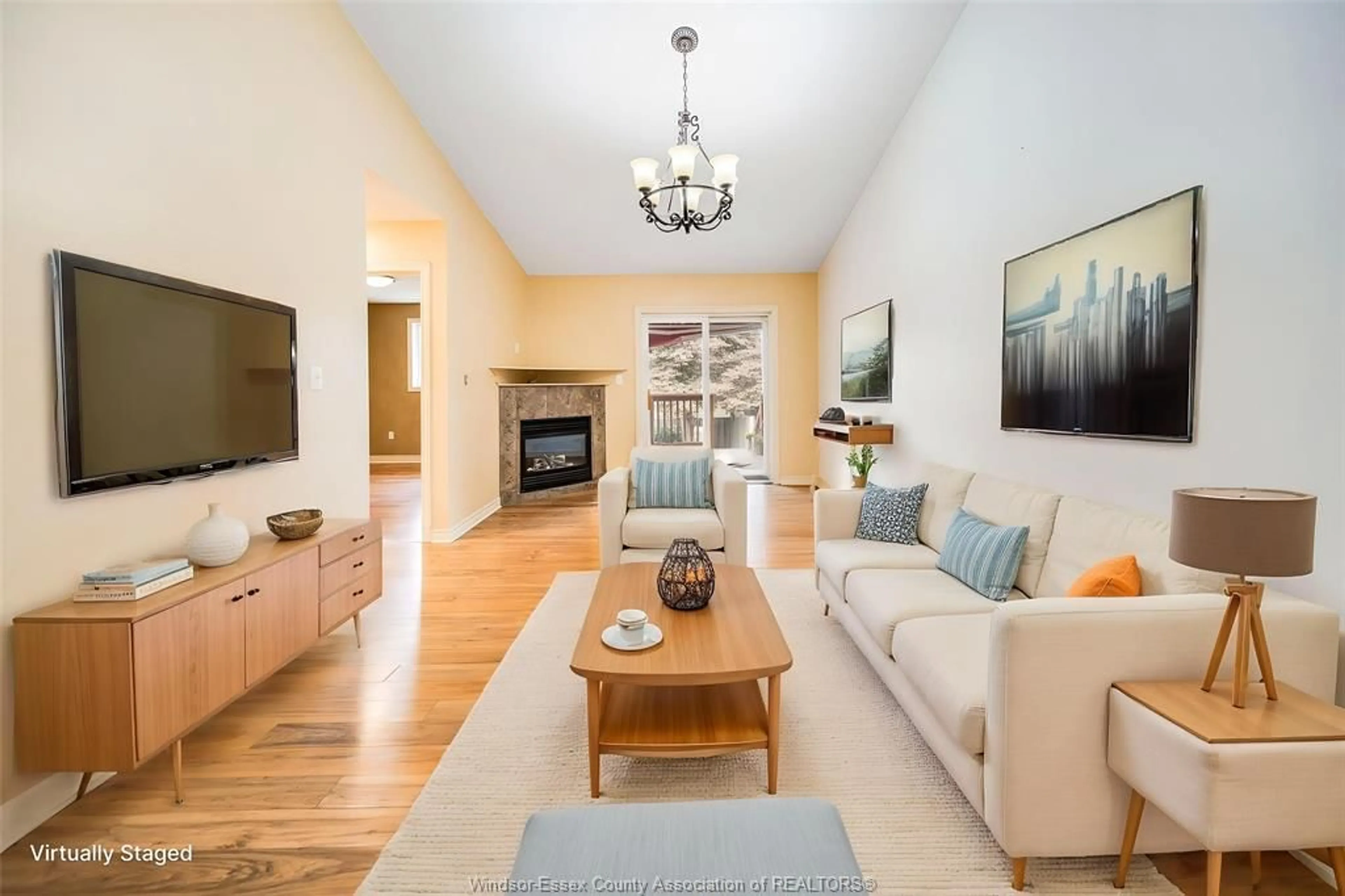 Living room with furniture, wood/laminate floor for 1511 CHATEAU Ave, Windsor Ontario N8P 1M3