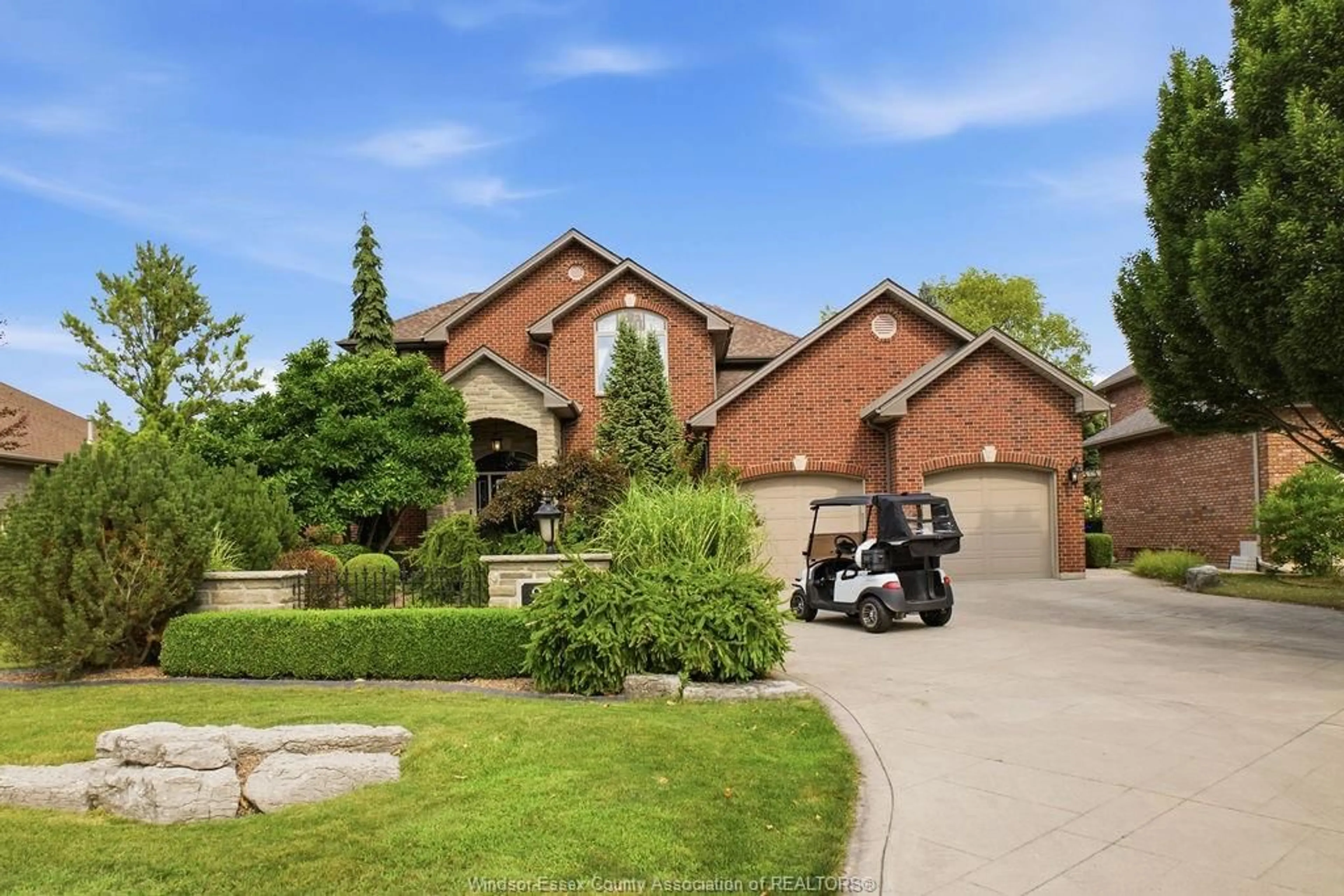 Home with brick exterior material, street for 205 CLUBVIEW Dr, Amherstburg Ontario N9V 3Z3