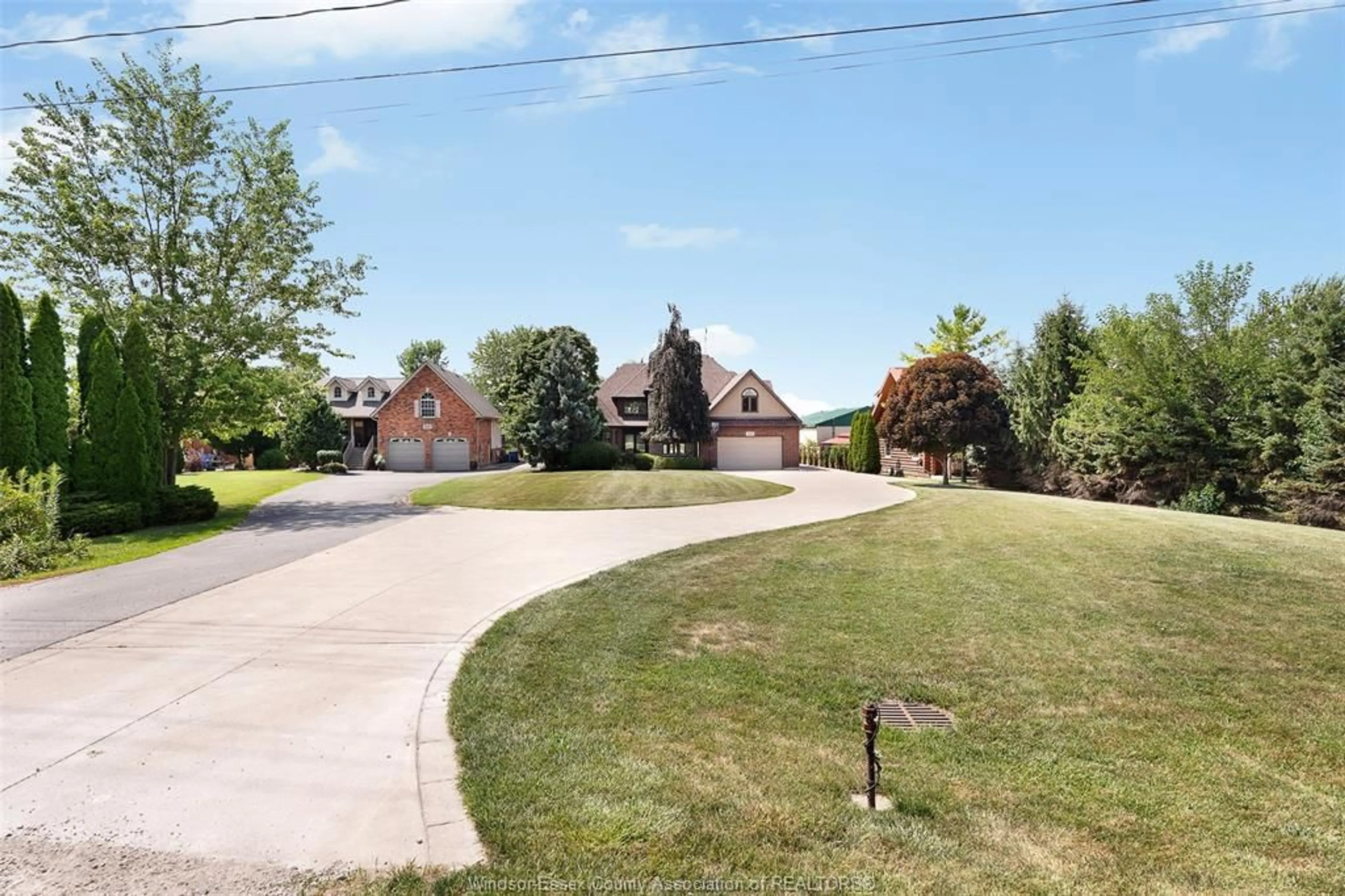 A pic from outside/outdoor area/front of a property/back of a property/a pic from drone, street for 2116 FRONT Rd, Amherstburg Ontario N9V 3R3