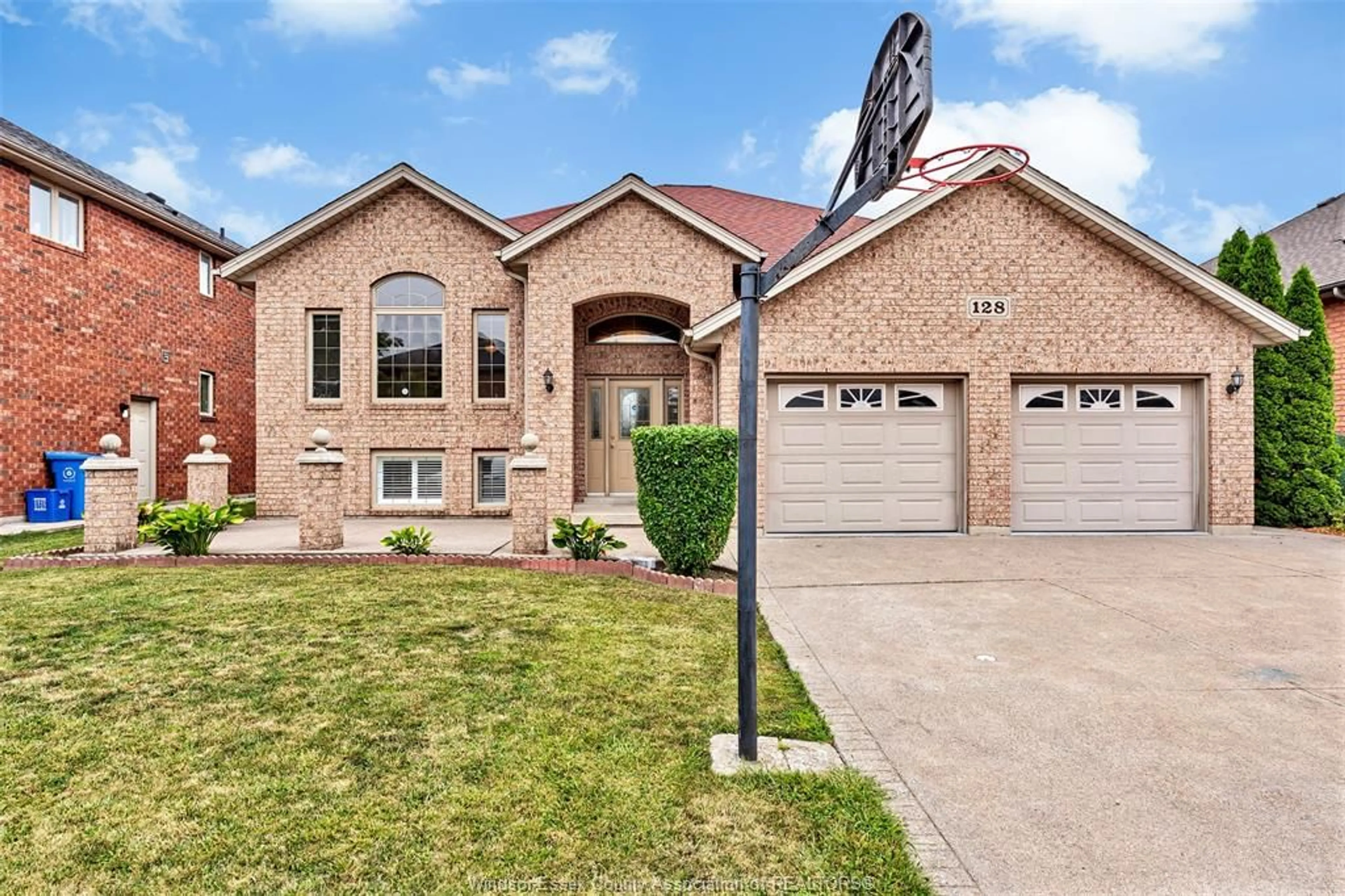 Home with brick exterior material, street for 128 MARINA GROVE, Lakeshore Ontario N9K 1C9