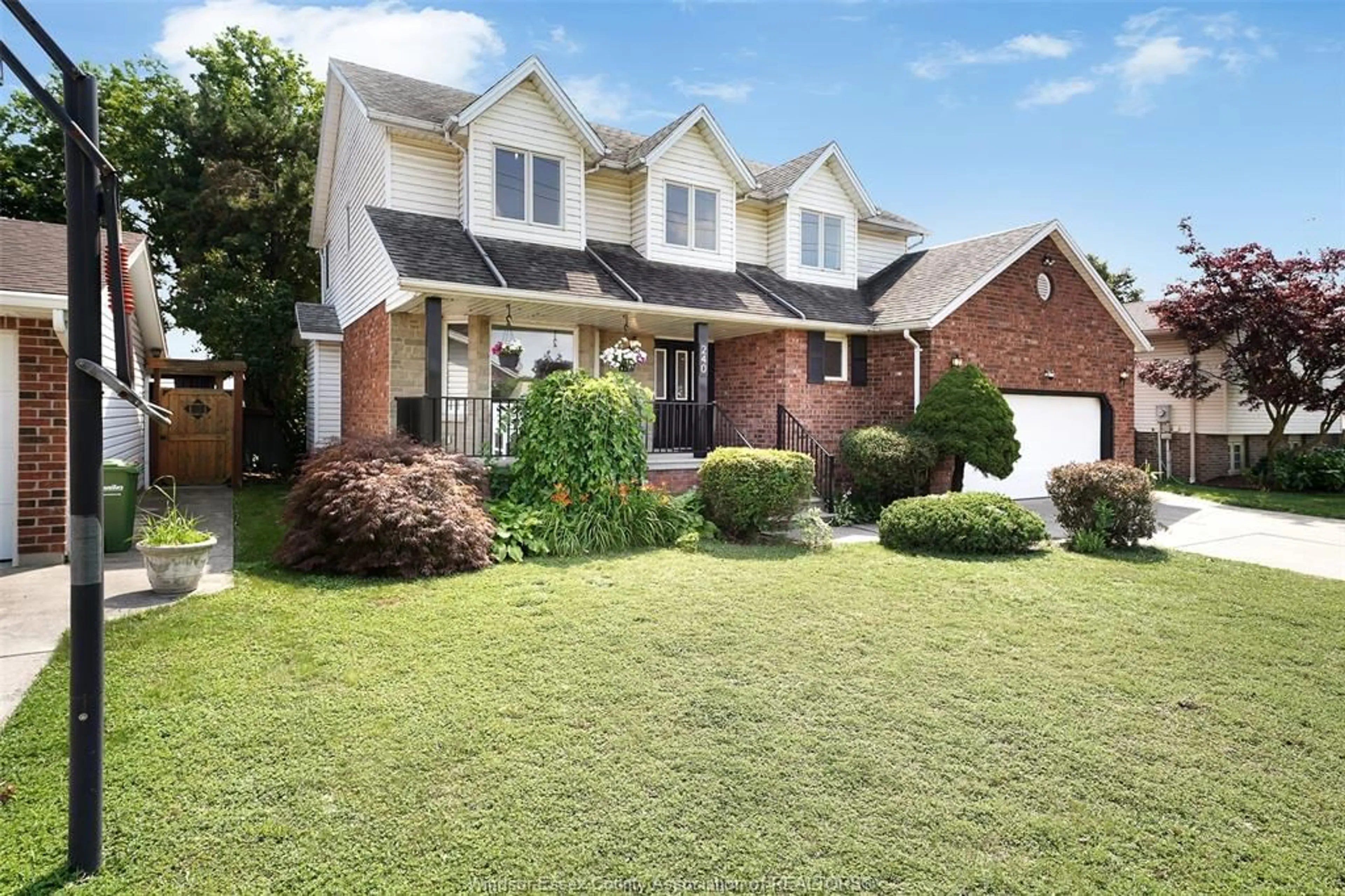 Home with brick exterior material, street for 240 Gary Ave, LaSalle Ontario N9J 1V2