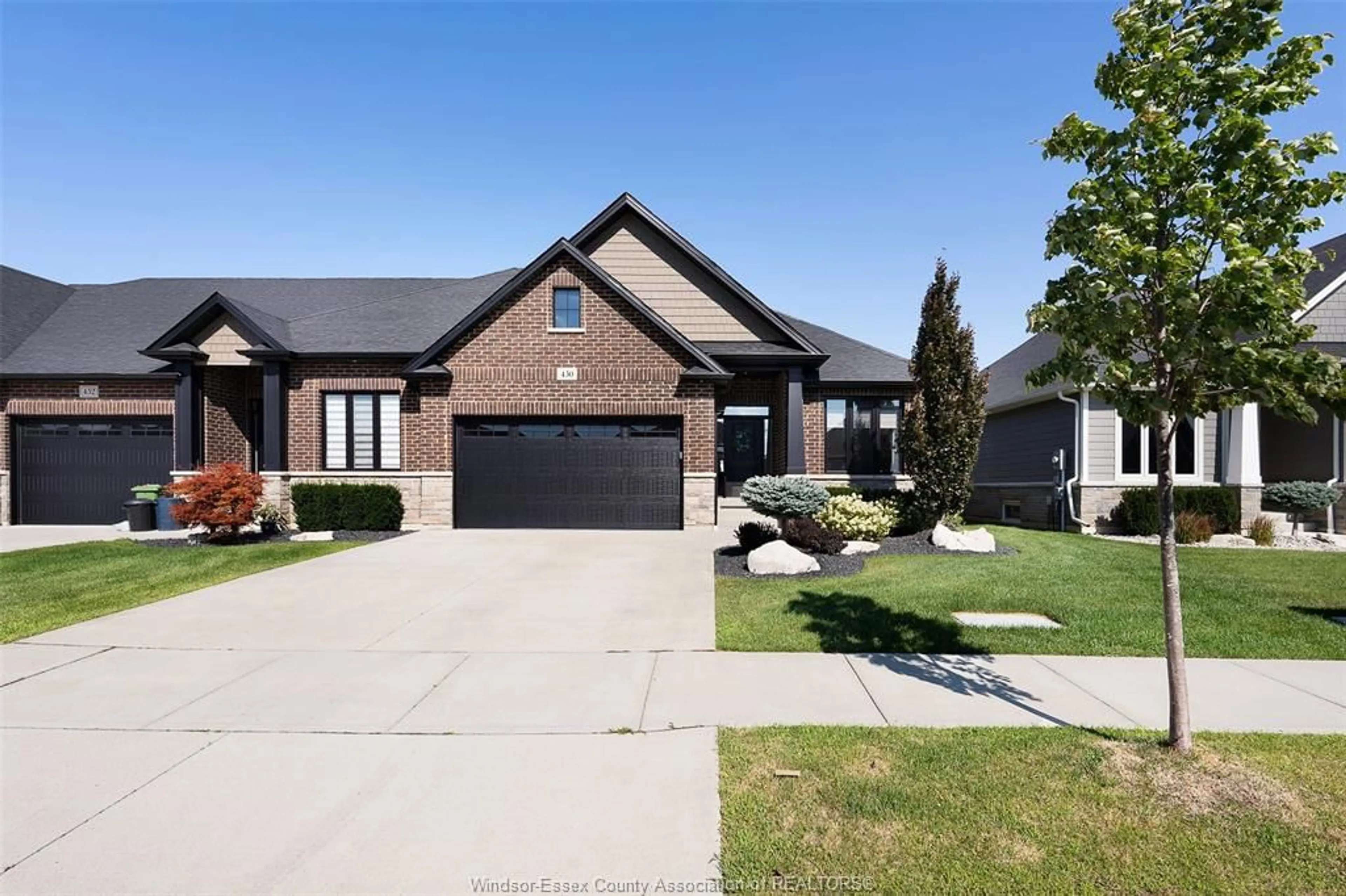 Home with brick exterior material, street for 450 BRUNMAR Cres, Lakeshore Ontario N8L 0Y2
