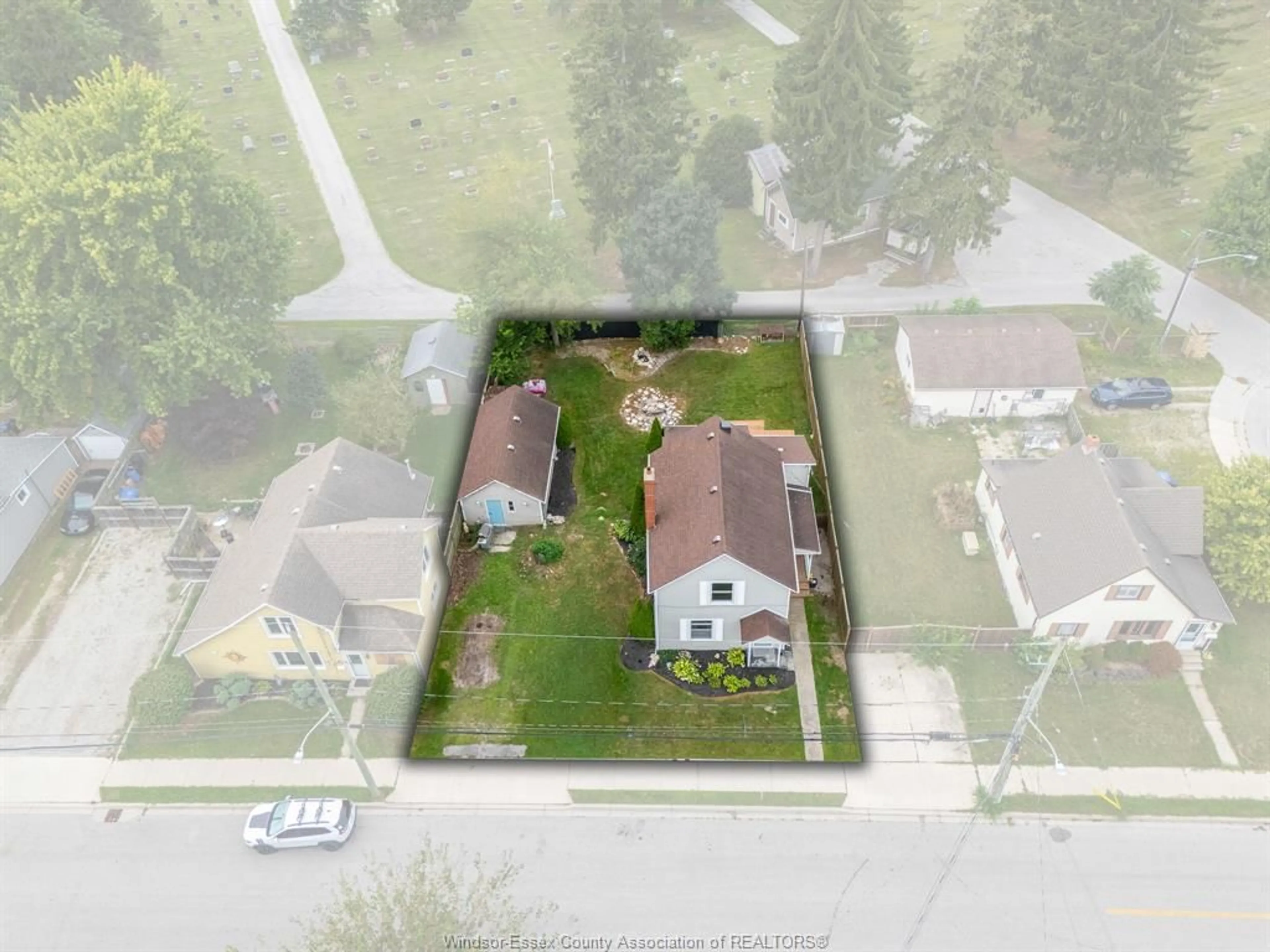 A pic from outside/outdoor area/front of a property/back of a property/a pic from drone, street for 58 McDONALD St, Kingsville Ontario N9Y 2C3
