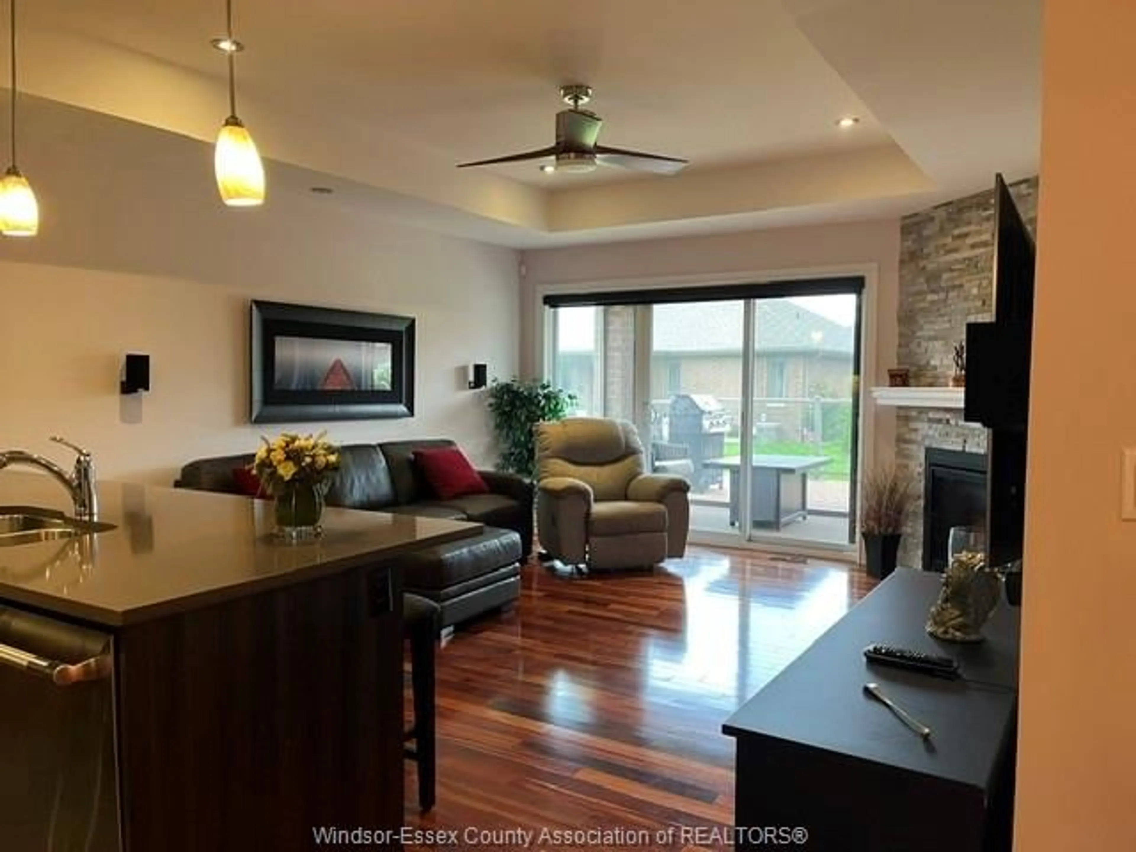 Living room with furniture, wood/laminate floor for 2272 GATWICK, Windsor Ontario N8P 0B7
