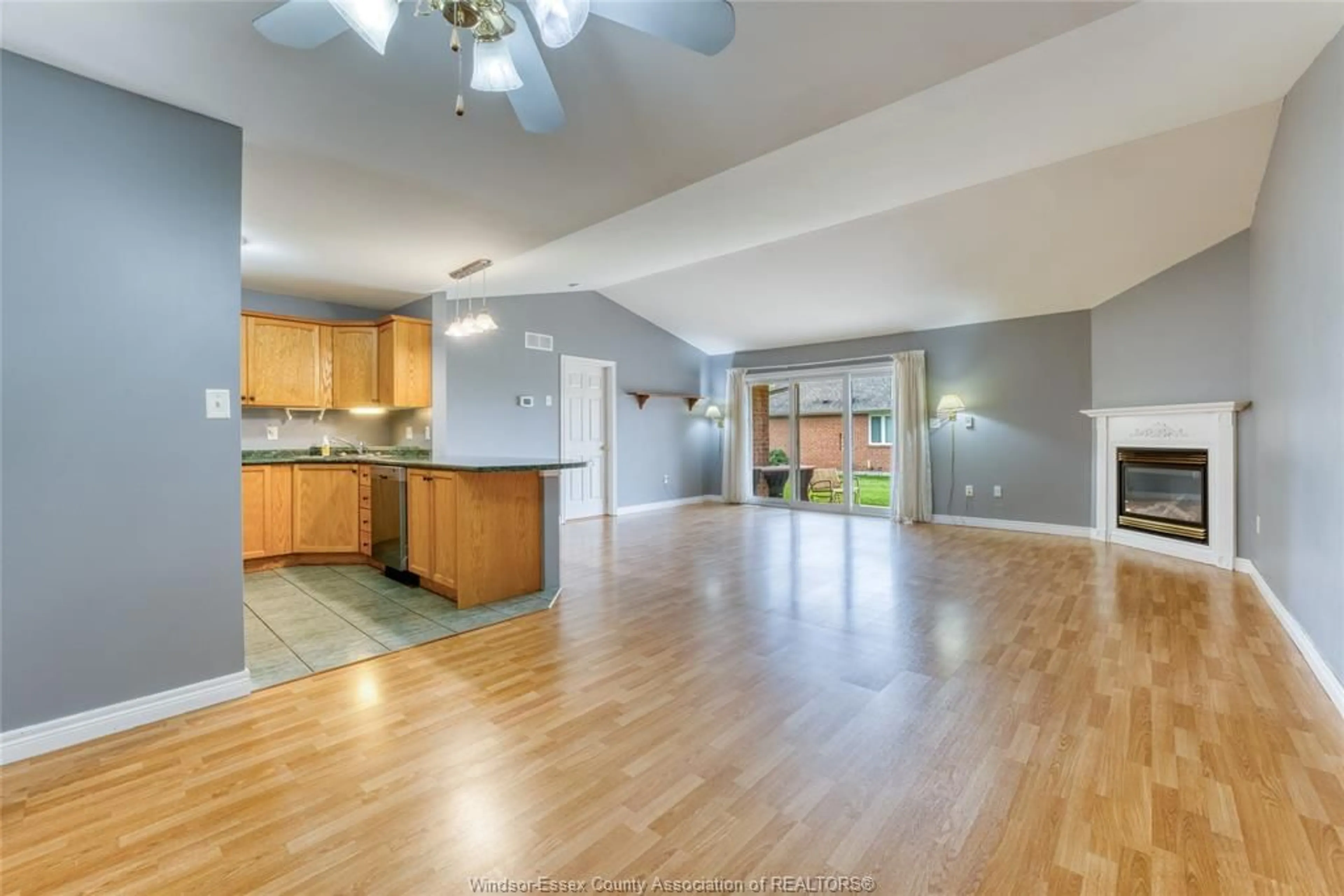 Open concept kitchen, wood/laminate floor for 11181 FIRGROVE, Windsor Ontario N8P 1M6