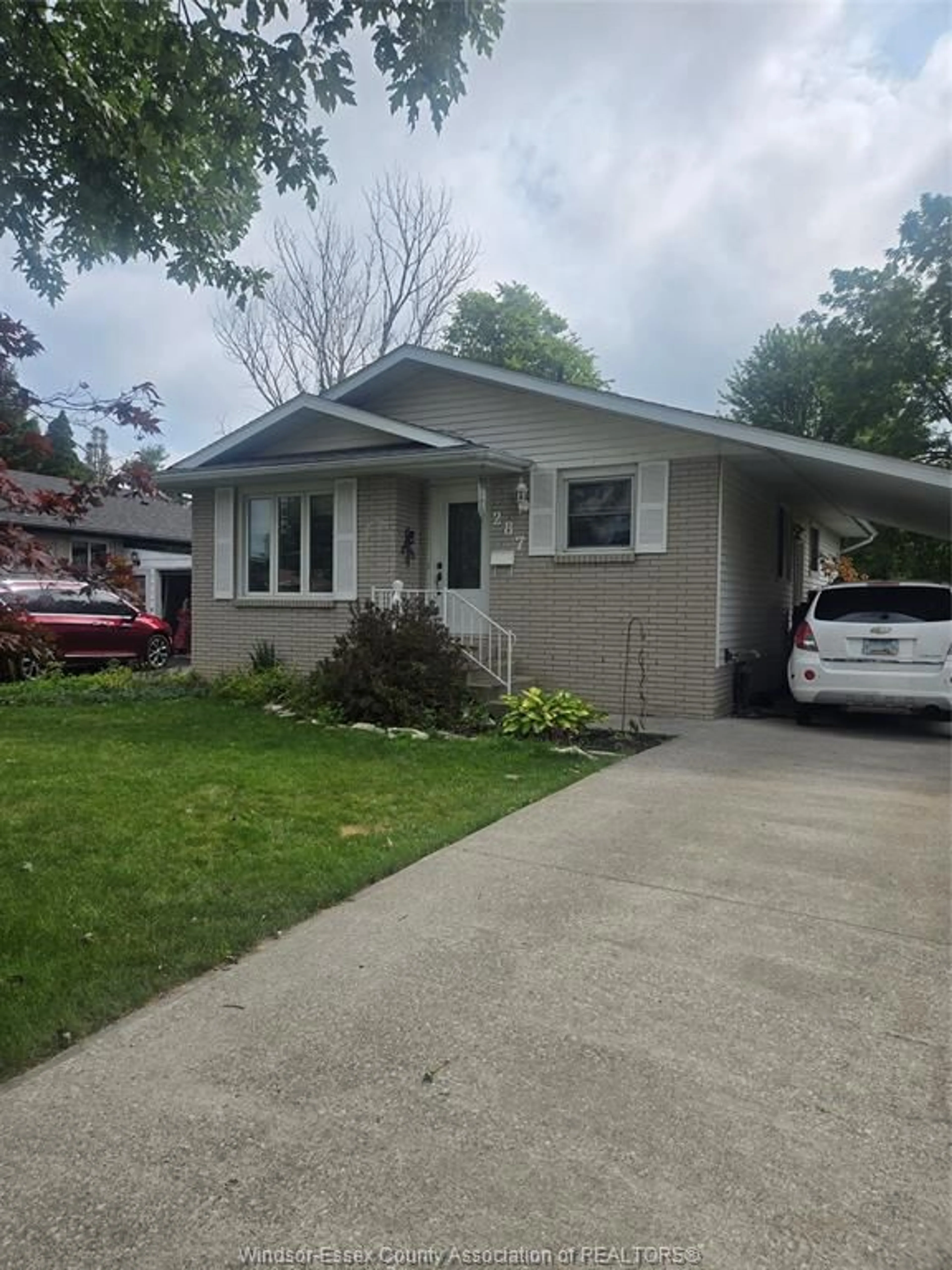 Home with vinyl exterior material, street for 287 COGHILL Dr, Kingsville Ontario N9Y 3K9