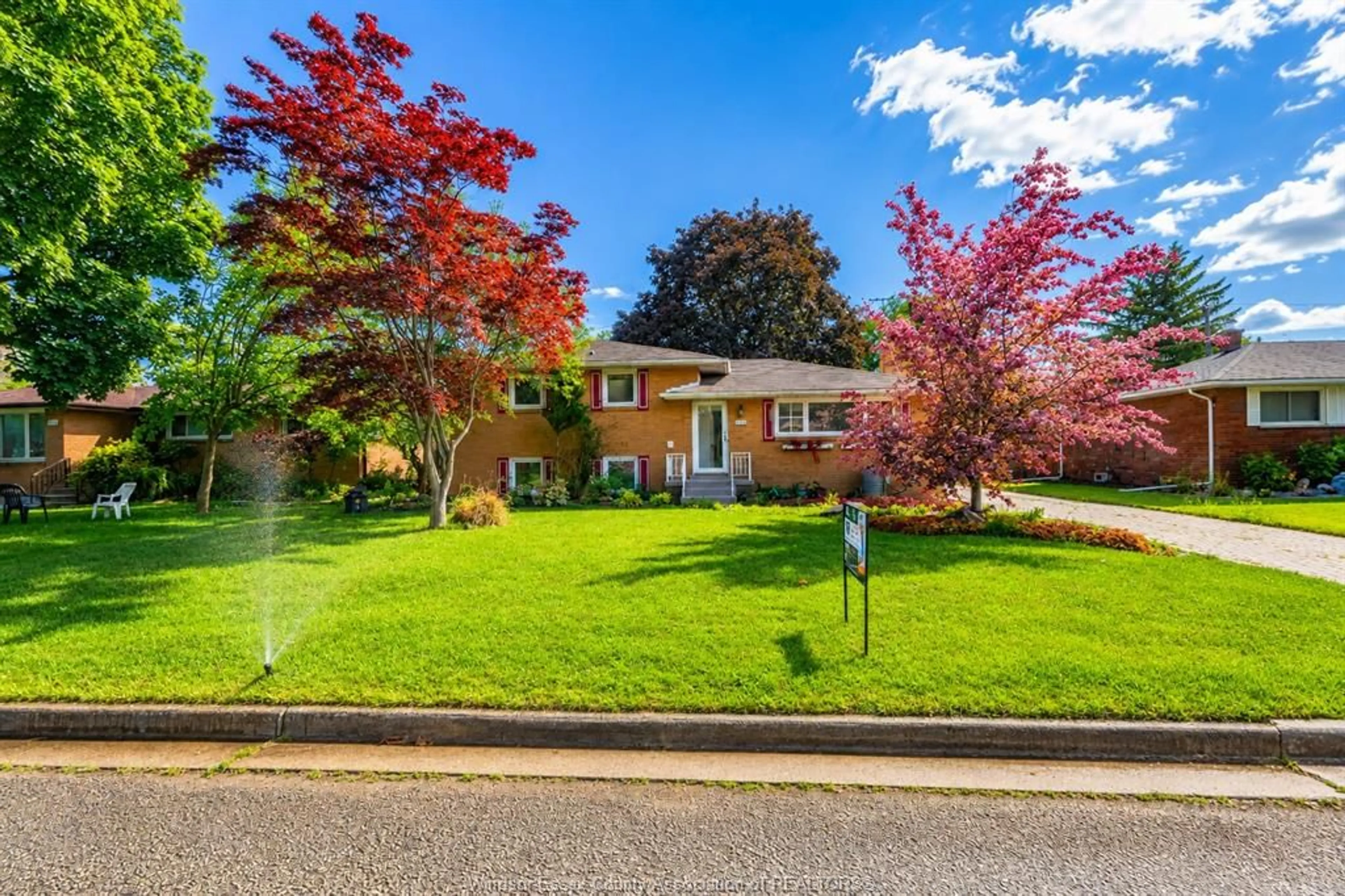 Home with vinyl exterior material, street for 2445 EVERTS, Windsor Ontario N9E 2T8