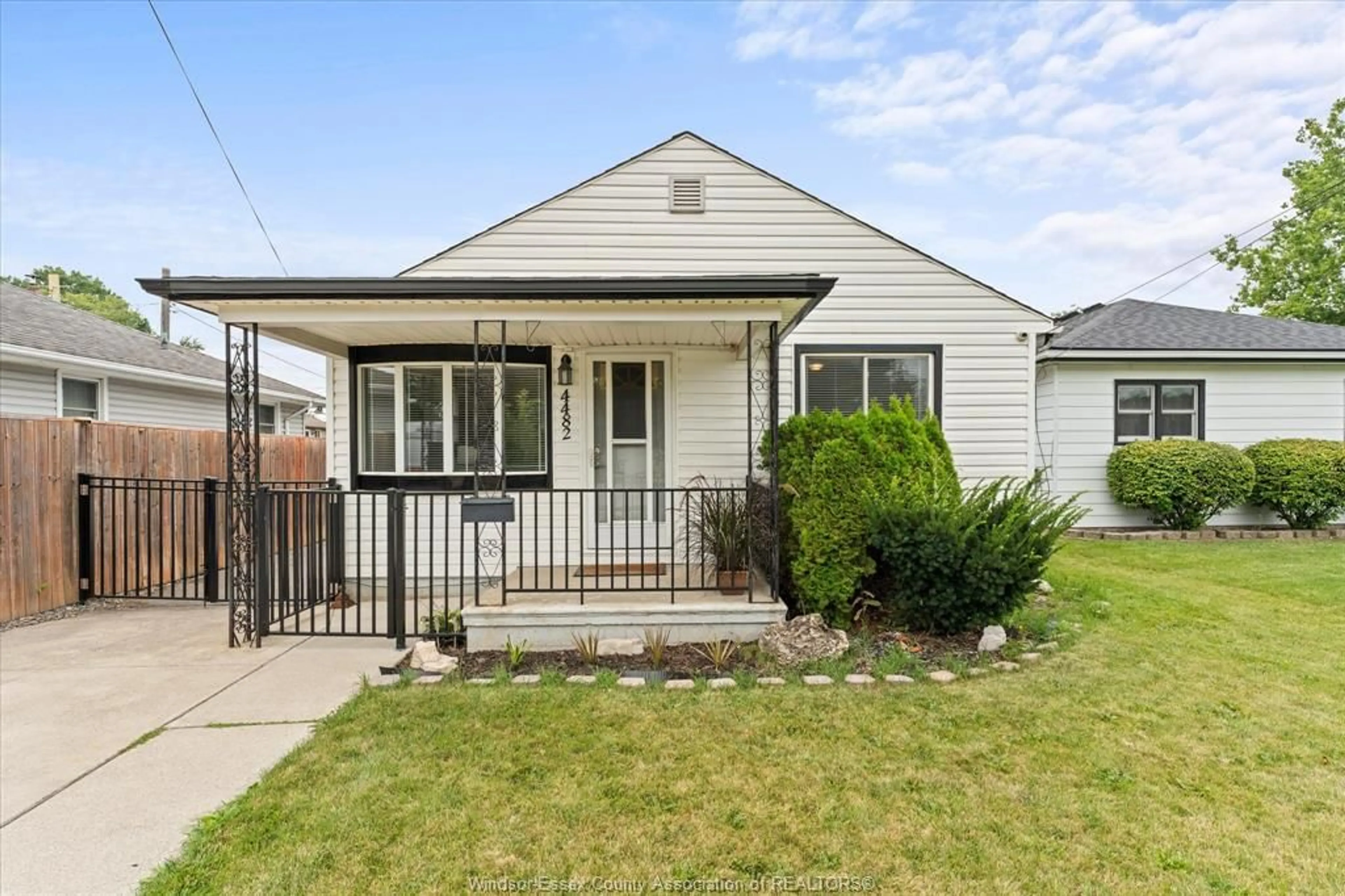 Home with vinyl exterior material, street for 4482 Grand Marais Rd, Windsor Ontario N8W 1X7