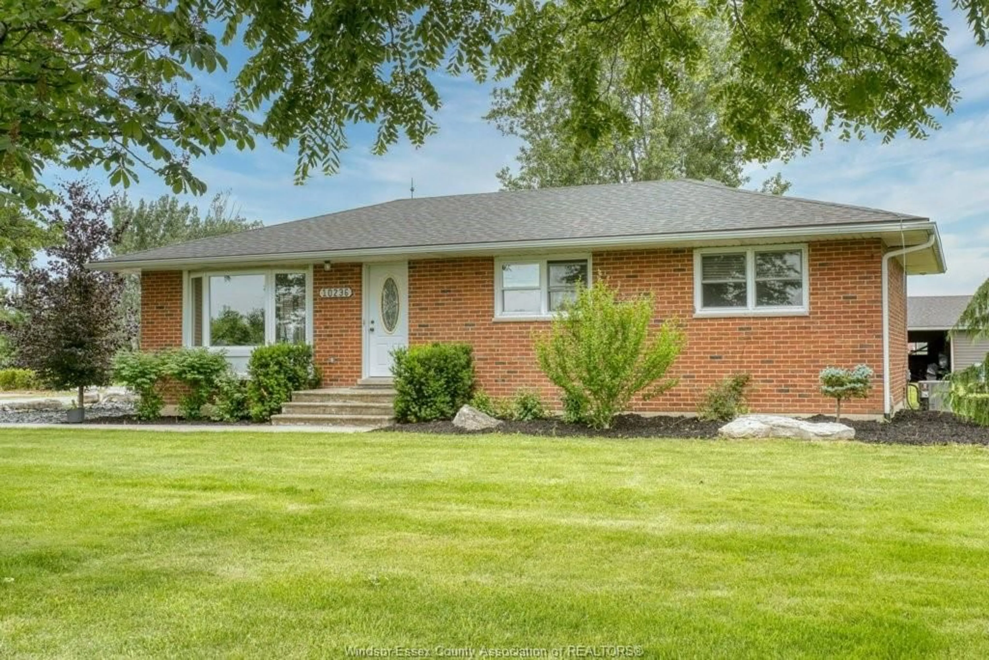 Home with brick exterior material, street for 10236 COUNTY RD 11, Amherstburg Ontario N0R 1J0