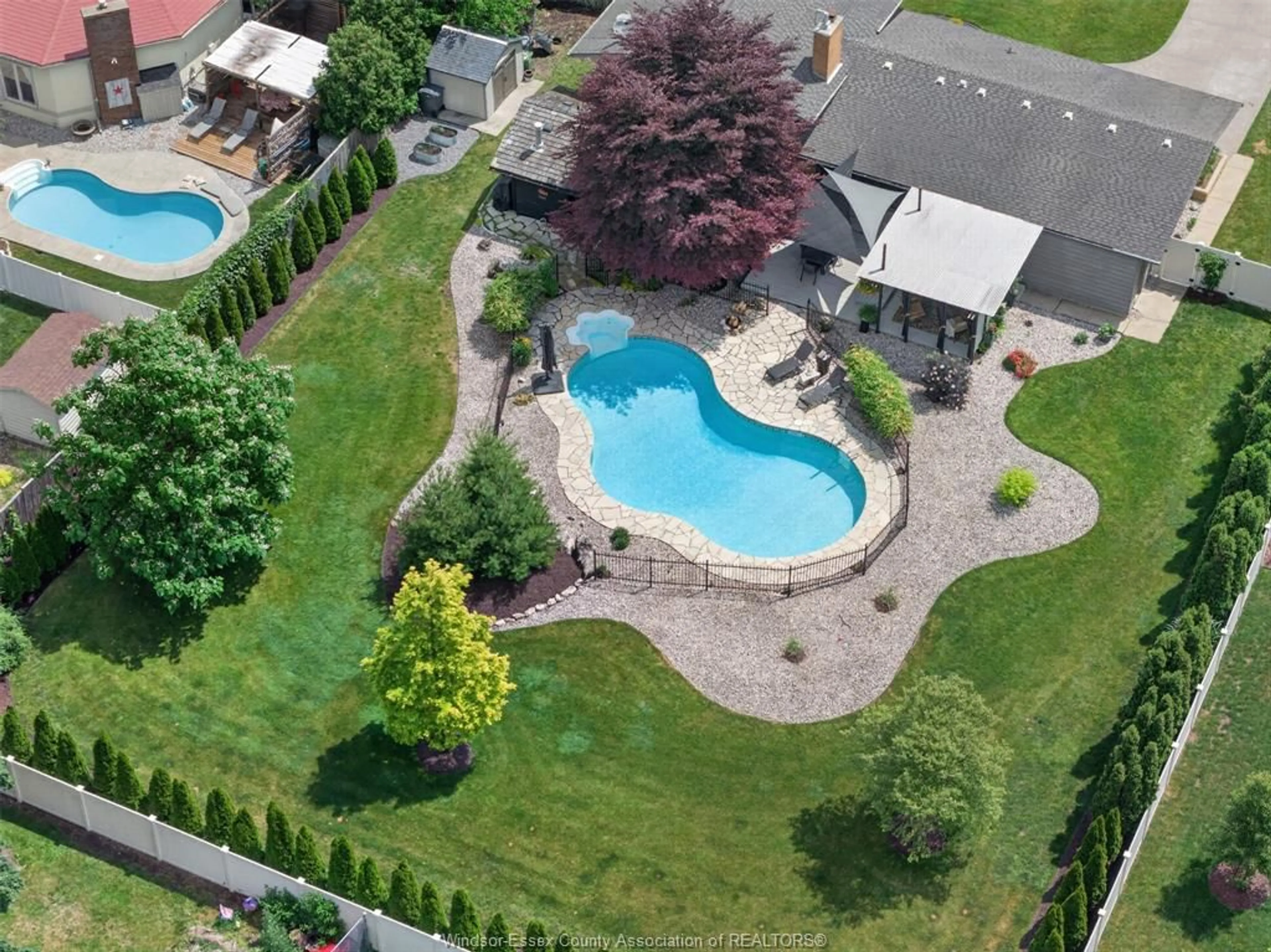 A pic from outside/outdoor area/front of a property/back of a property/a pic from drone, water/lake/river/ocean view for 421 Arlington, Tecumseh Ontario N8N 2K1