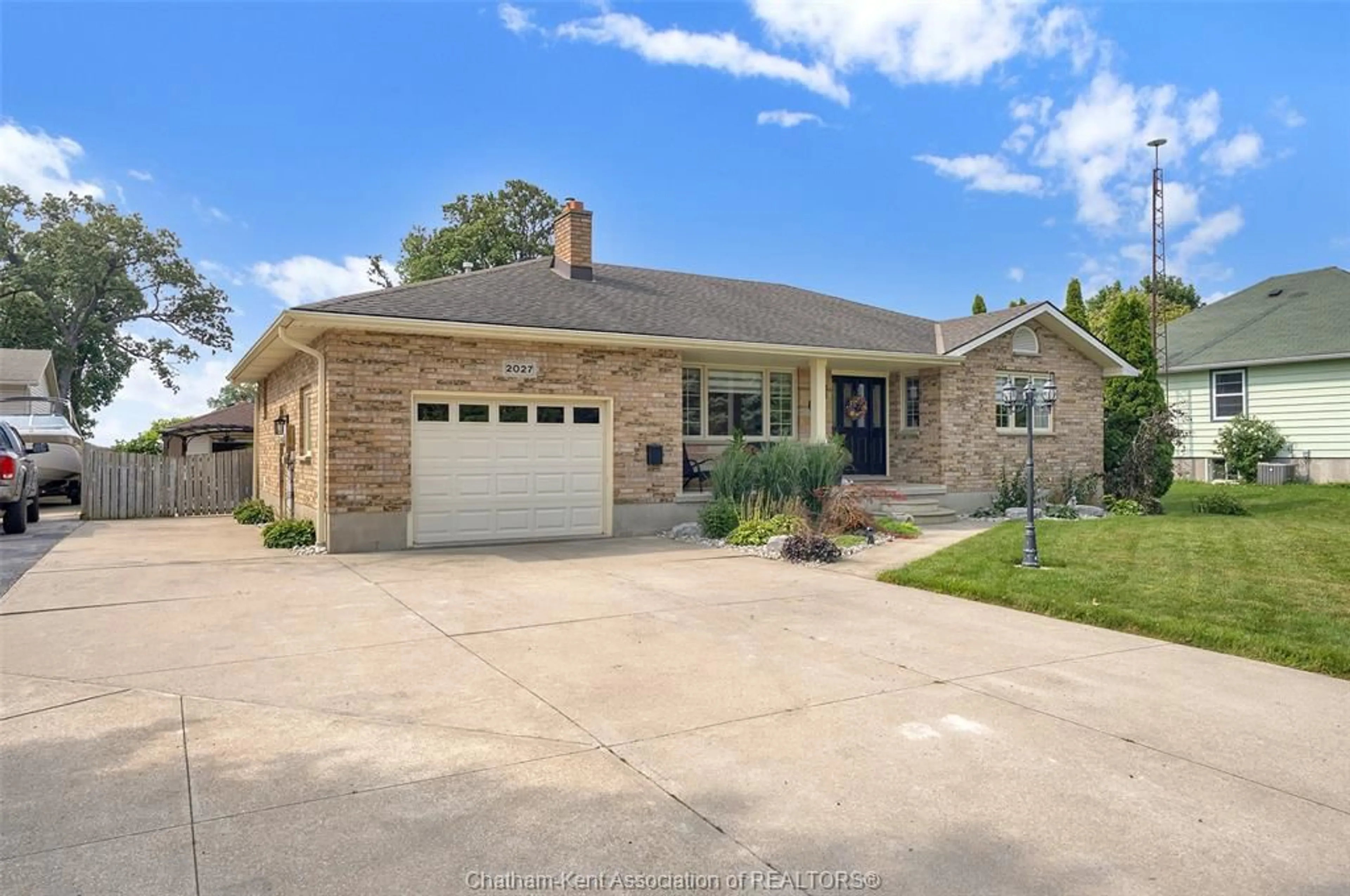 Home with brick exterior material, street for 2027 Dufferin Ave, Wallaceburg Ontario N8A 4M5