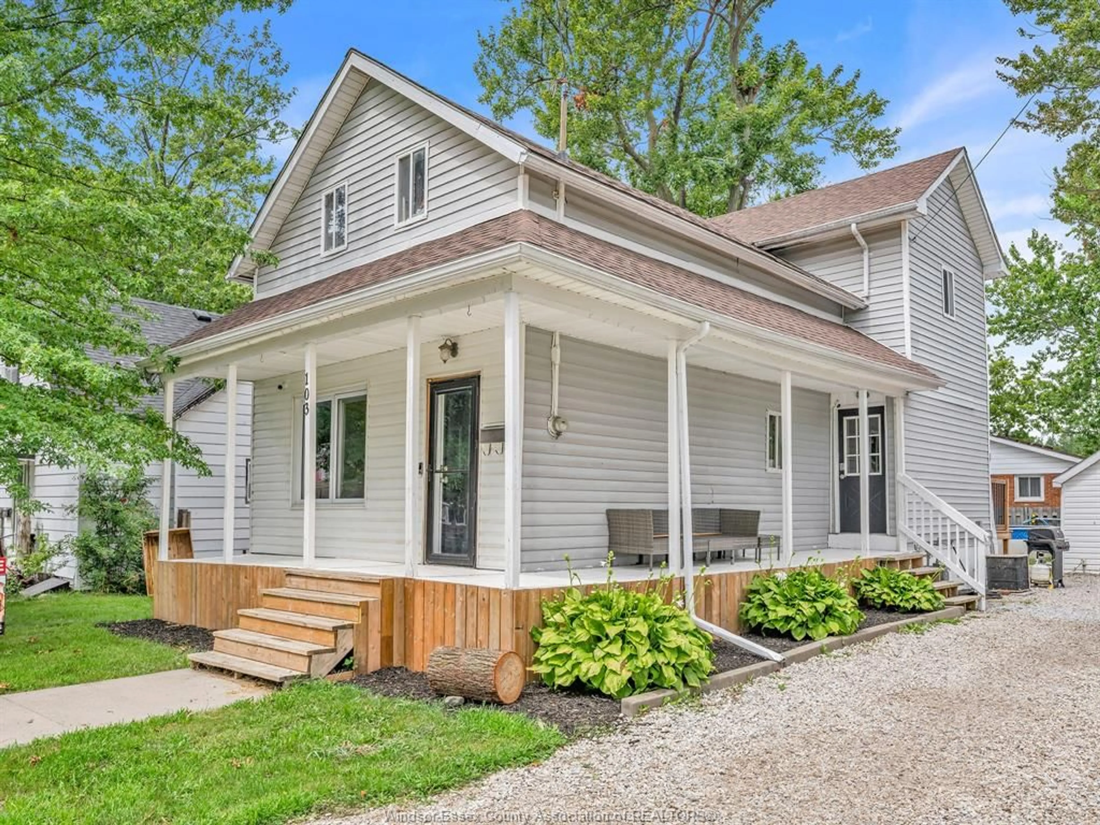 Home with vinyl exterior material, street for 103 LAIRD, Essex Ontario N8M 1S2
