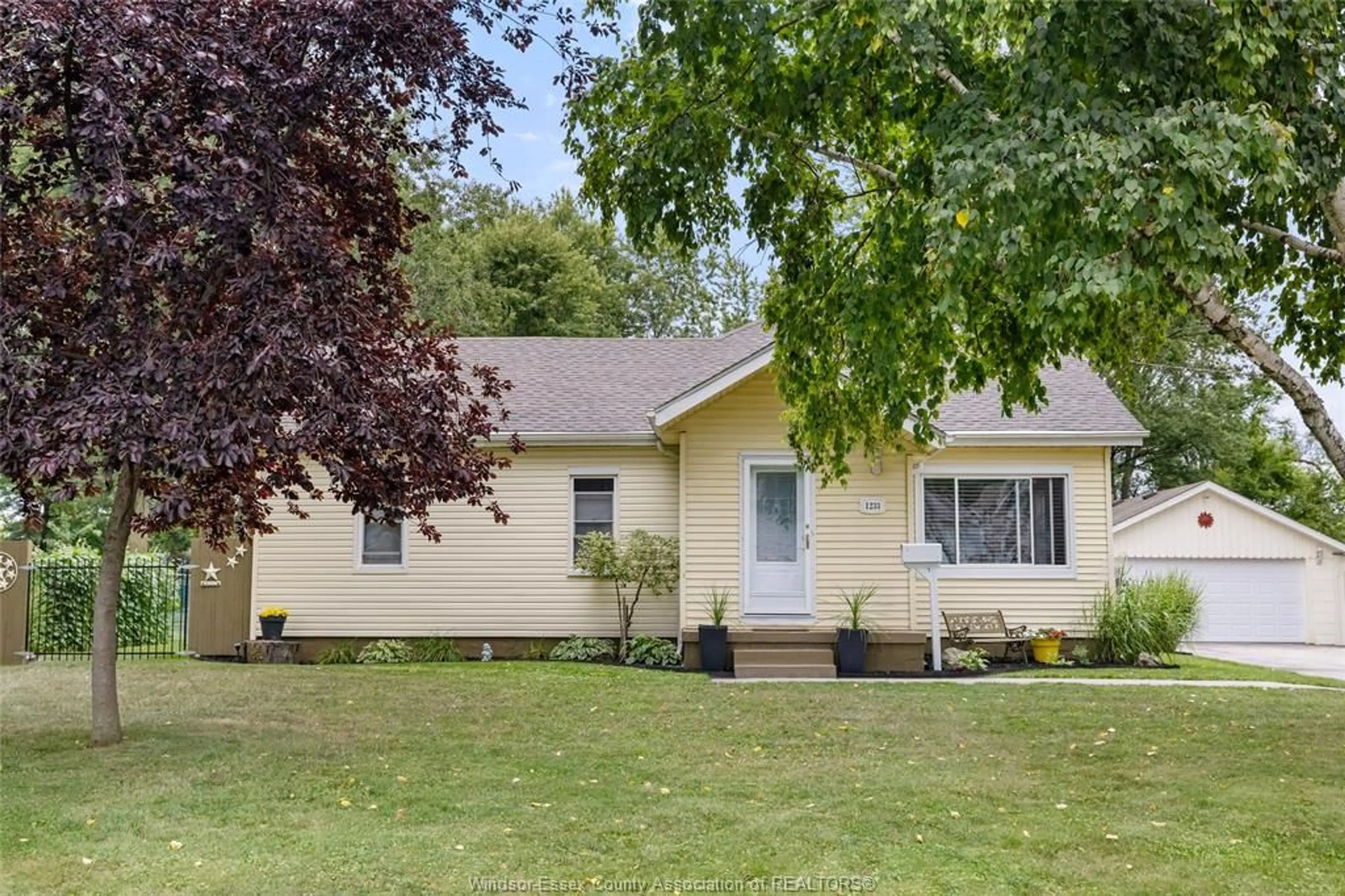 Home with vinyl exterior material, street for 1233 Croydon Dr, LaSalle Ontario N9H 1B3