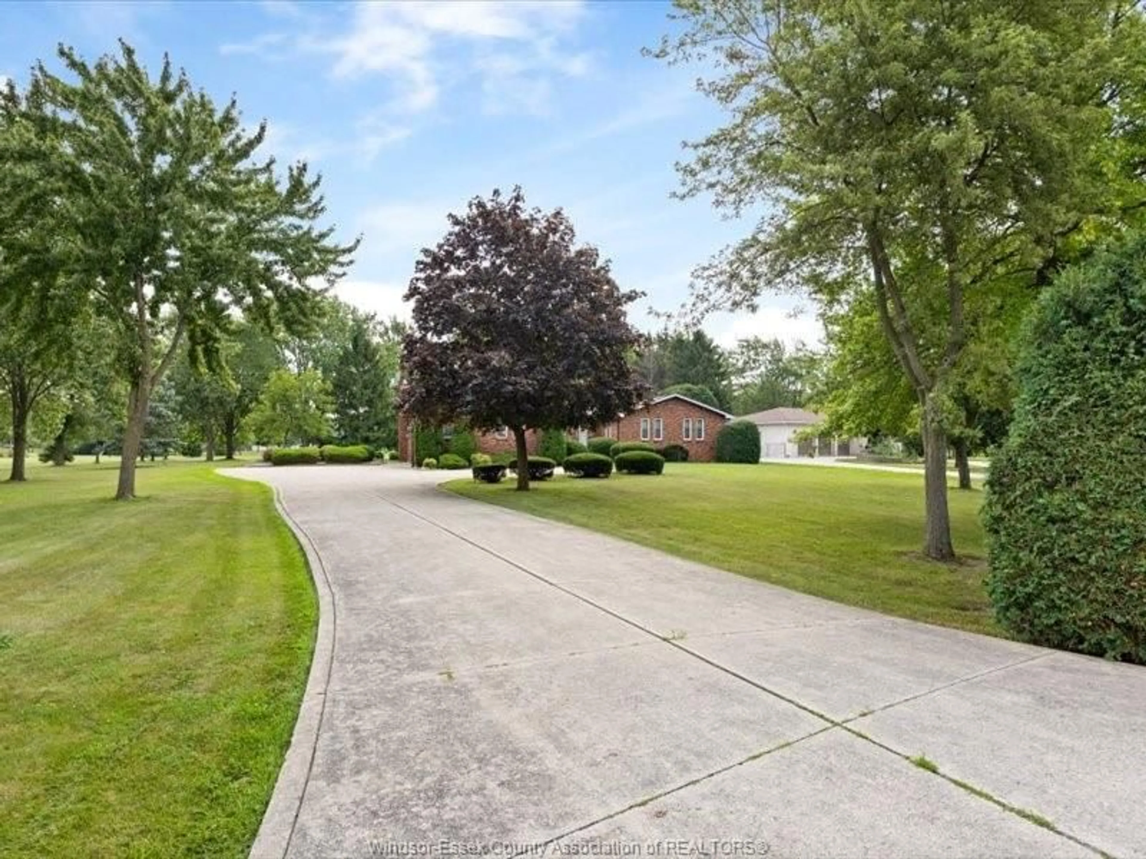 A pic from outside/outdoor area/front of a property/back of a property/a pic from drone, street for 6360 Huron Church, LaSalle Ontario N9H 0J7