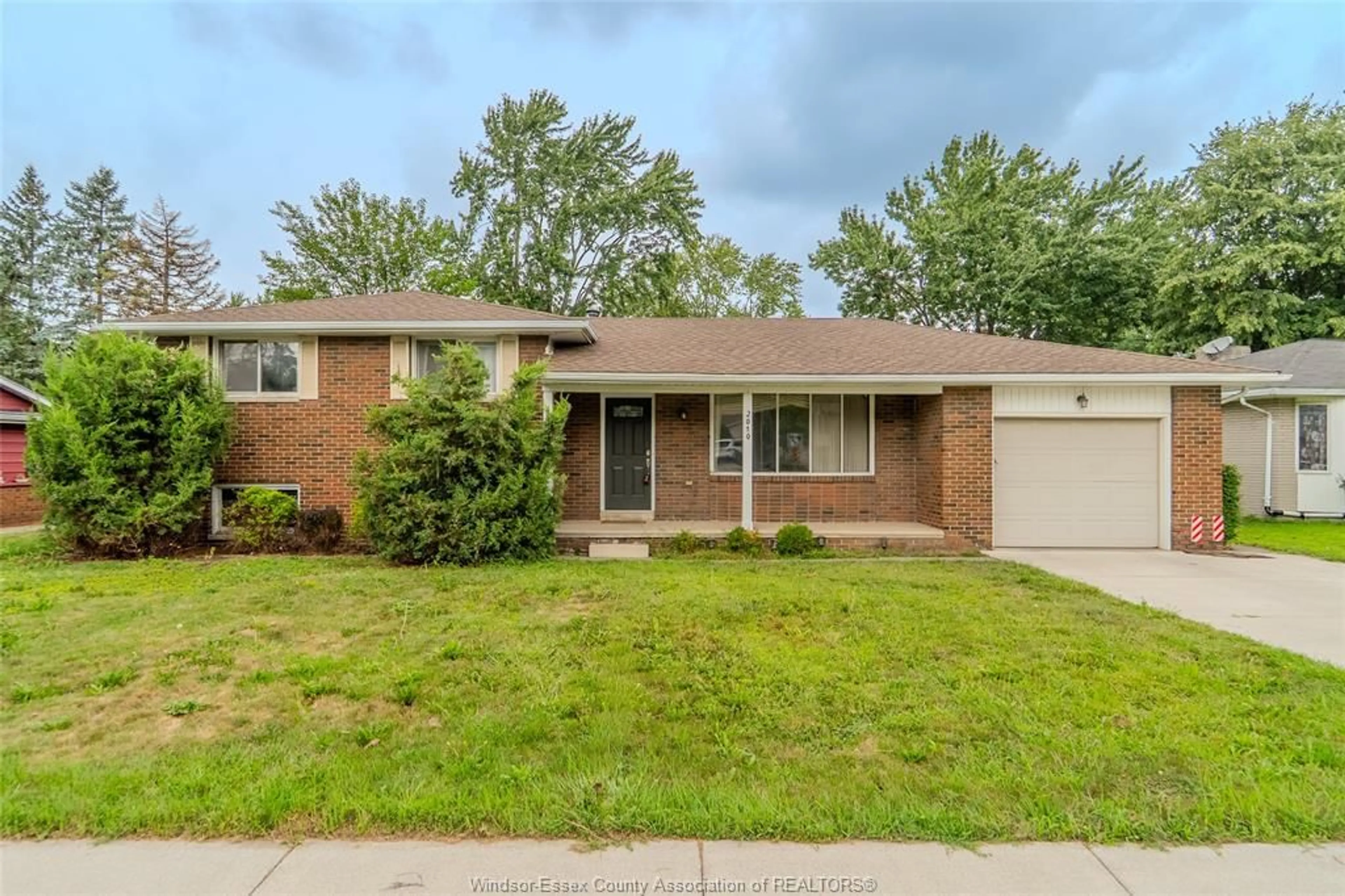 Home with brick exterior material, street for 2010 Grand Marais Rd, Windsor Ontario N9E 1G1