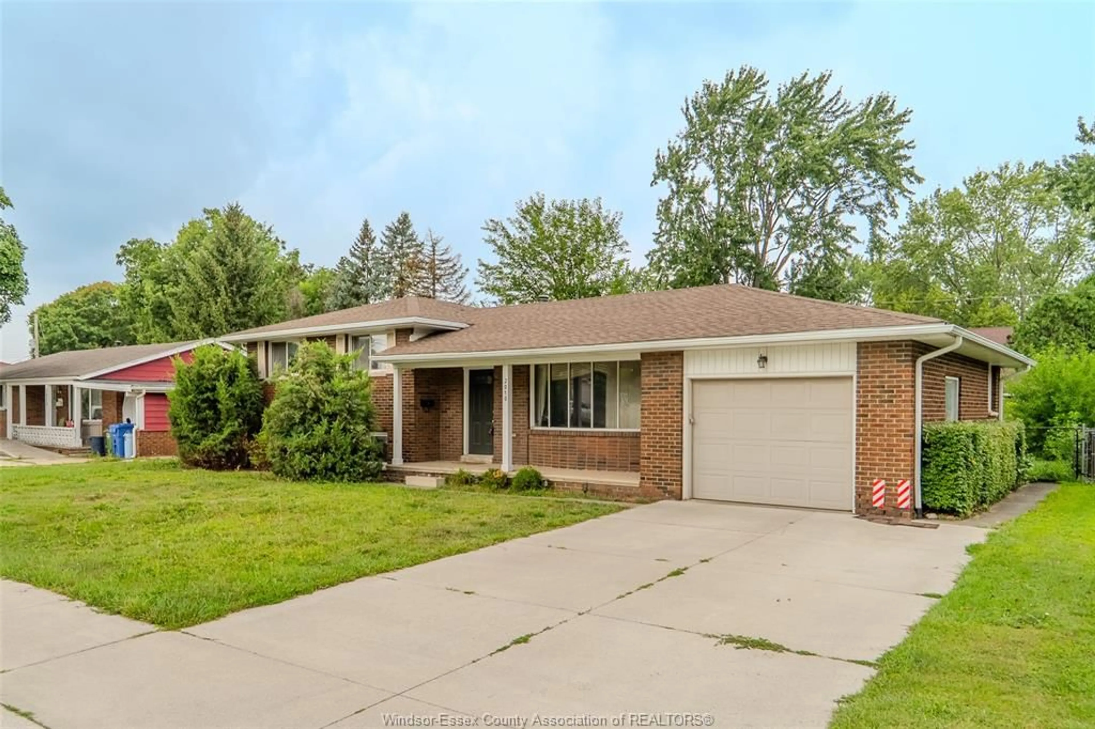 Home with brick exterior material, street for 2010 Grand Marais Rd, Windsor Ontario N9E 1G1