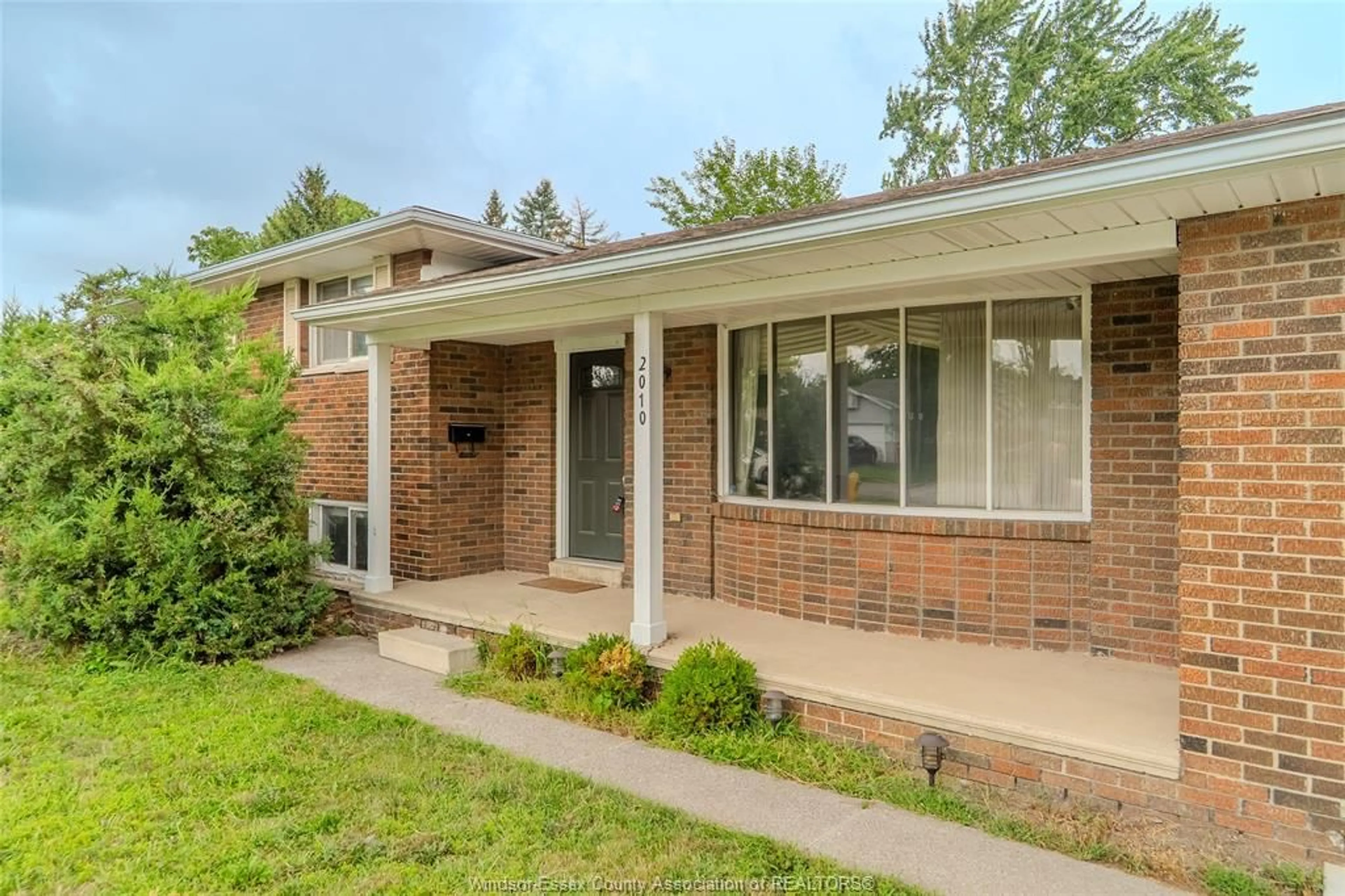 Home with brick exterior material, street for 2010 Grand Marais Rd, Windsor Ontario N9E 1G1