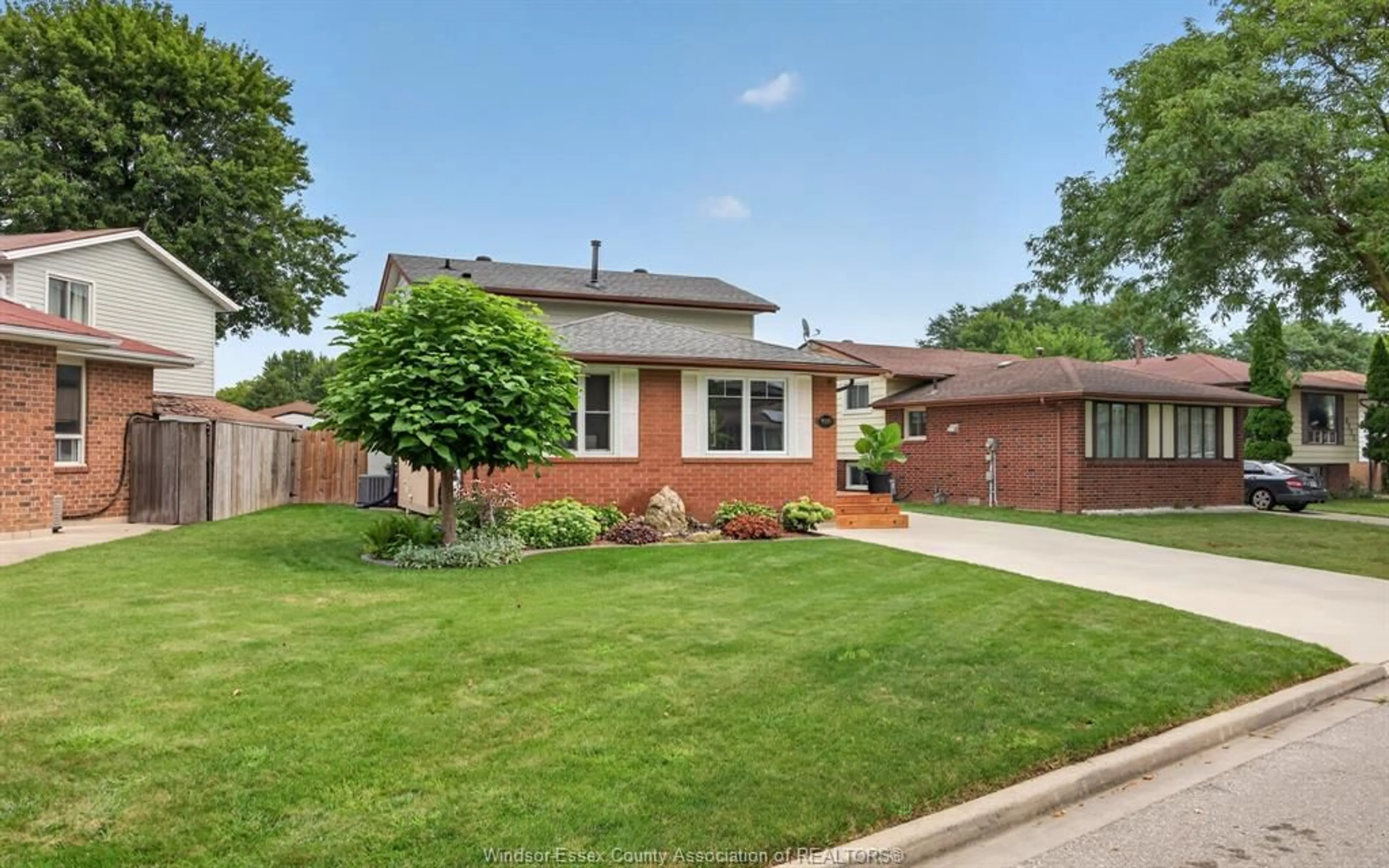 Home with brick exterior material, street for 9535 AVERY Lane, Windsor Ontario N8R 2C1