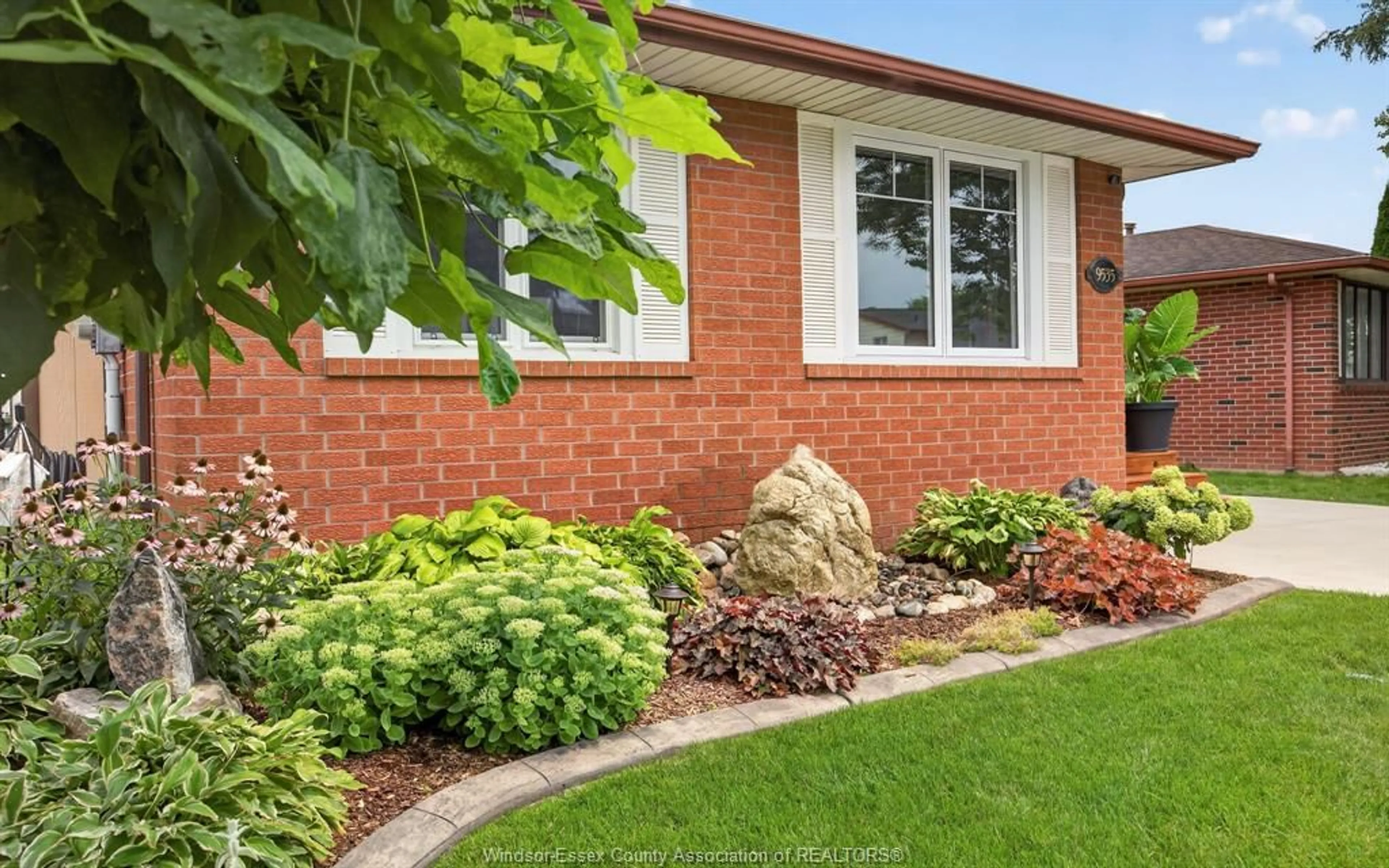 Home with brick exterior material, street for 9535 AVERY Lane, Windsor Ontario N8R 2C1