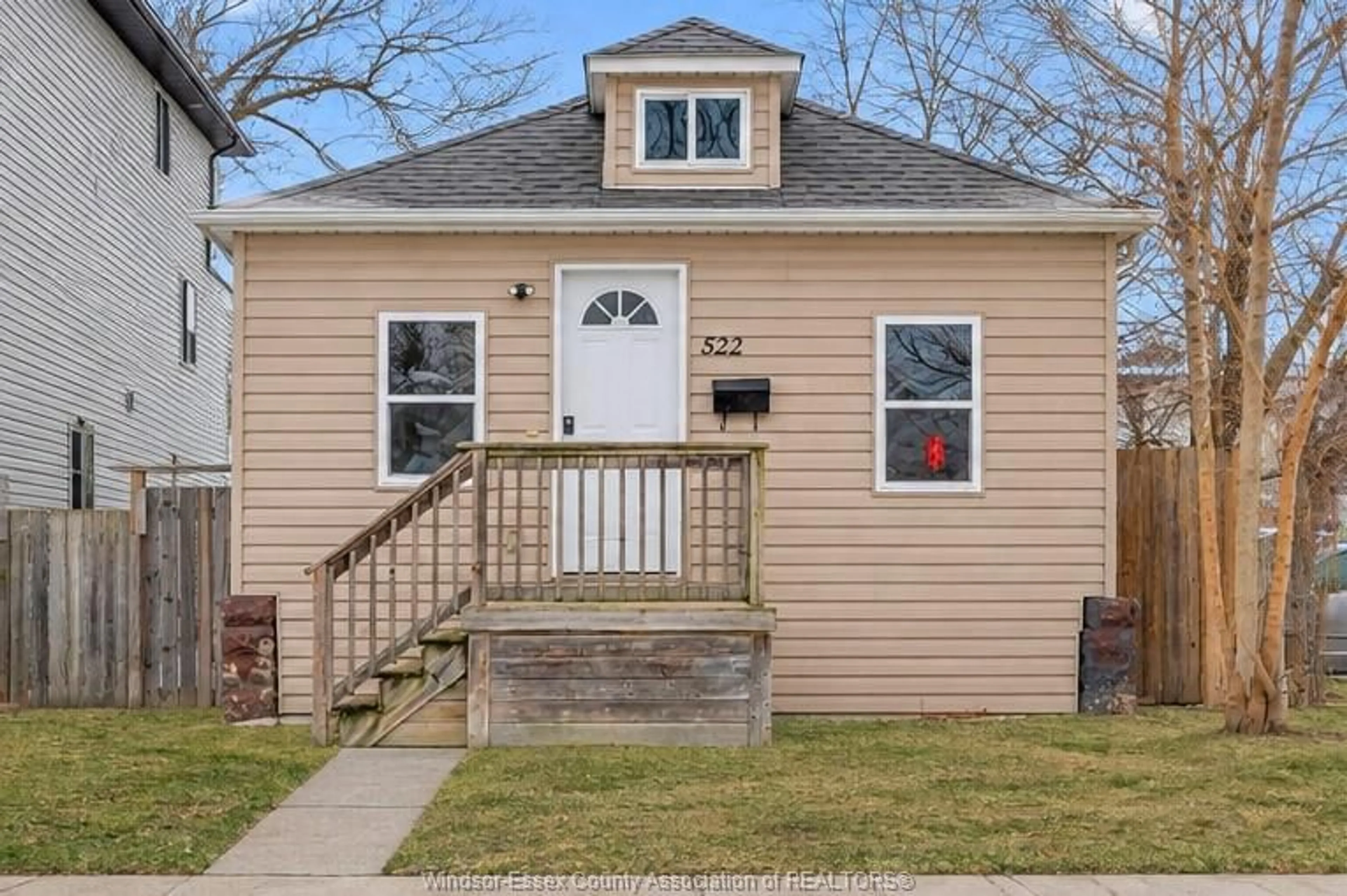 Home with vinyl exterior material, street for 522 BRIDGE, Windsor Ontario N9B 2M4