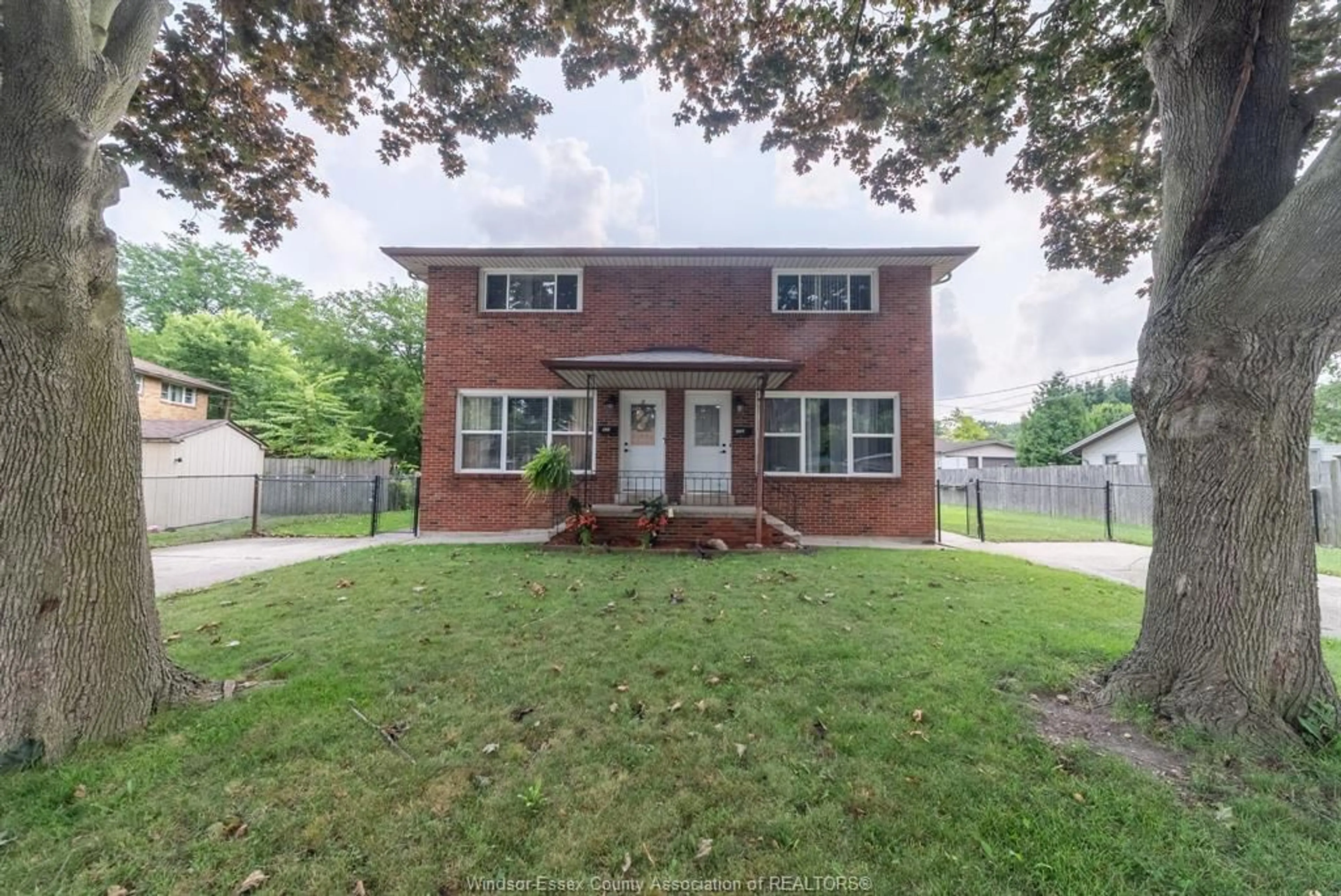 Home with brick exterior material, street for 824-826 SMEETON, Windsor Ontario N8S 3X5