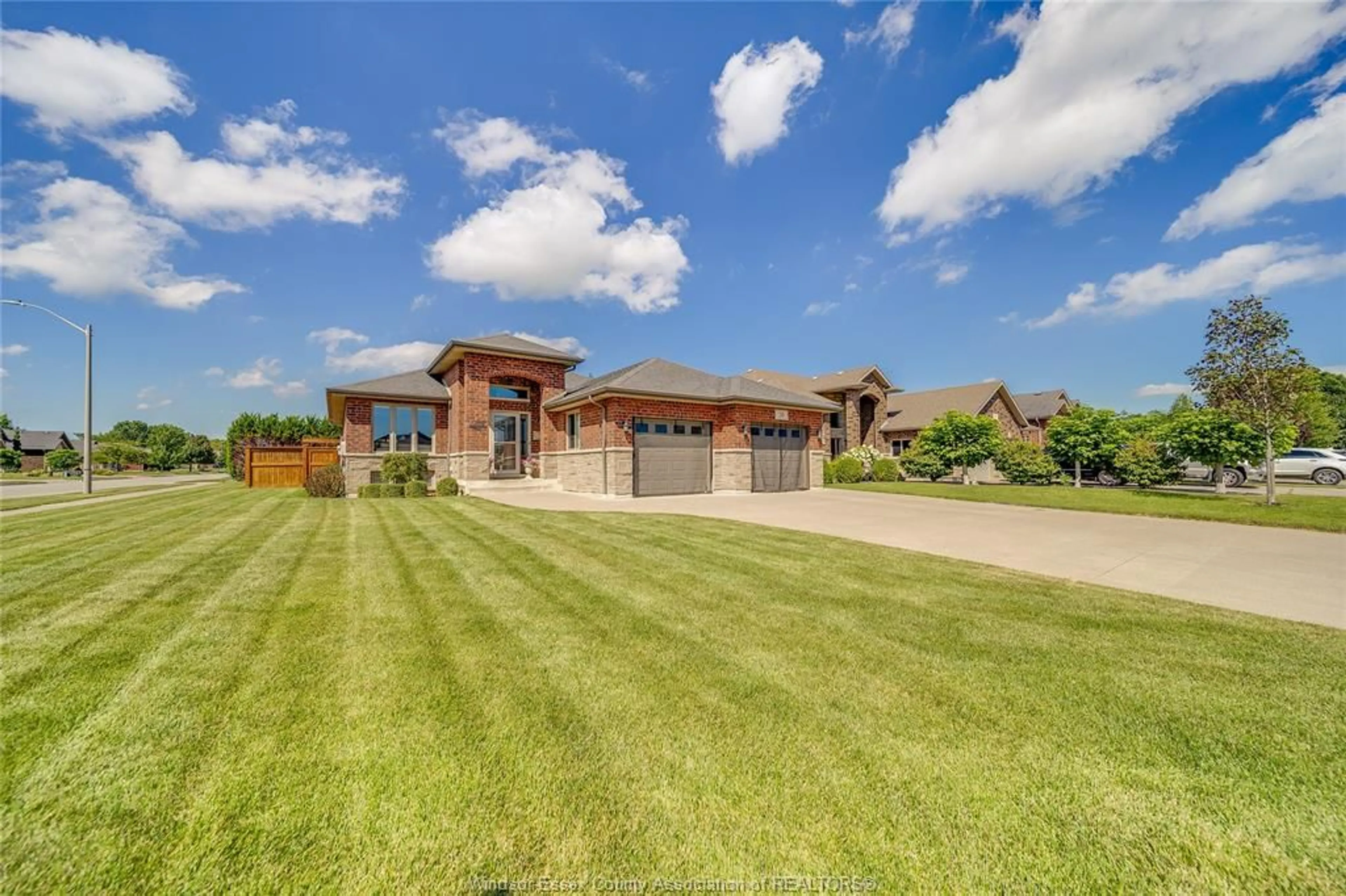 A pic from outside/outdoor area/front of a property/back of a property/a pic from drone, water/lake/river/ocean view for 35 MARSHWOODS Blvd, Kingsville Ontario N9Y 0A7